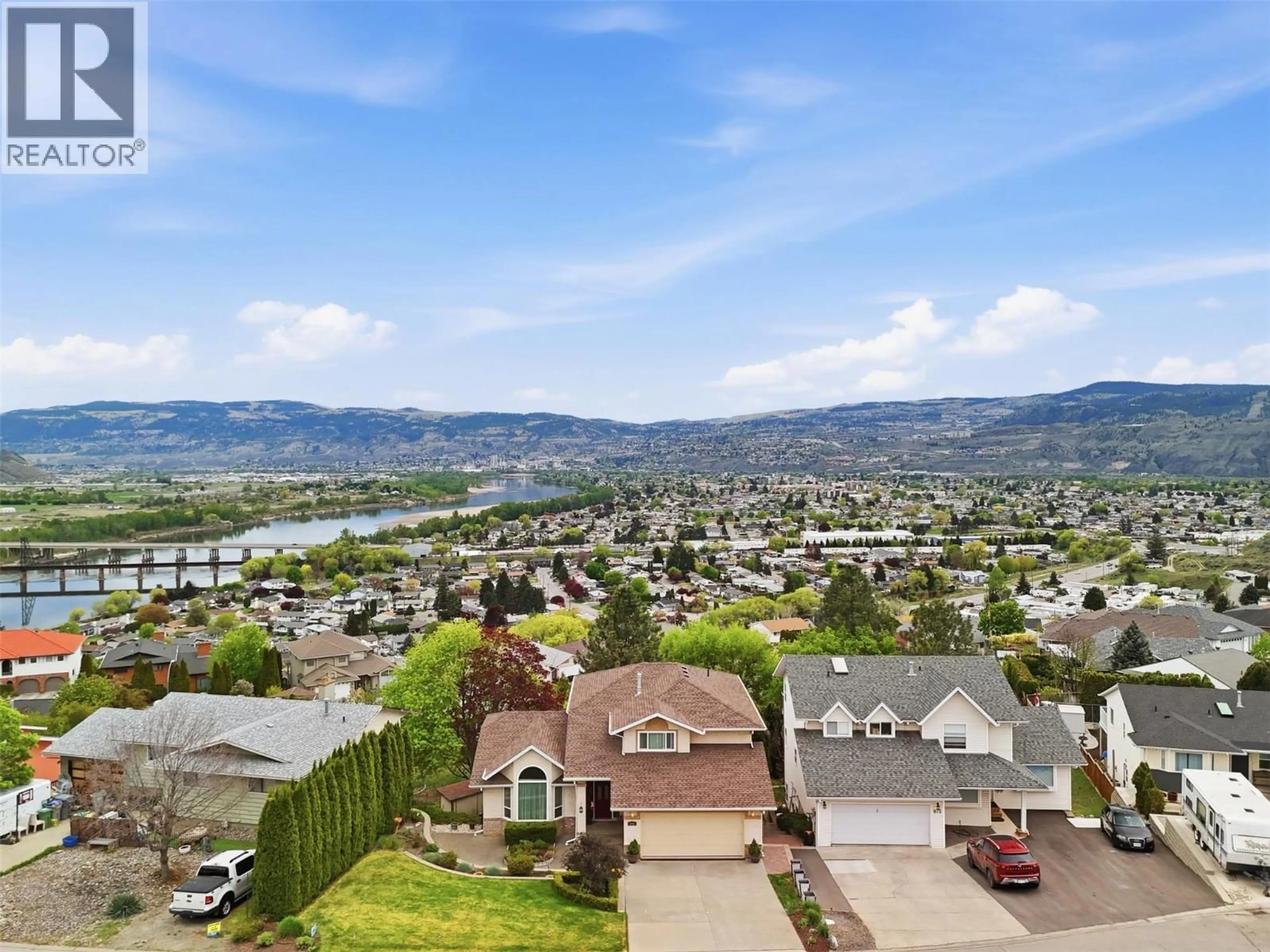A pic from outside/outdoor area/front of a property/back of a property/a pic from drone, mountain view for 865 NORVIEW ROAD, Kamloops British Columbia V2B7X3