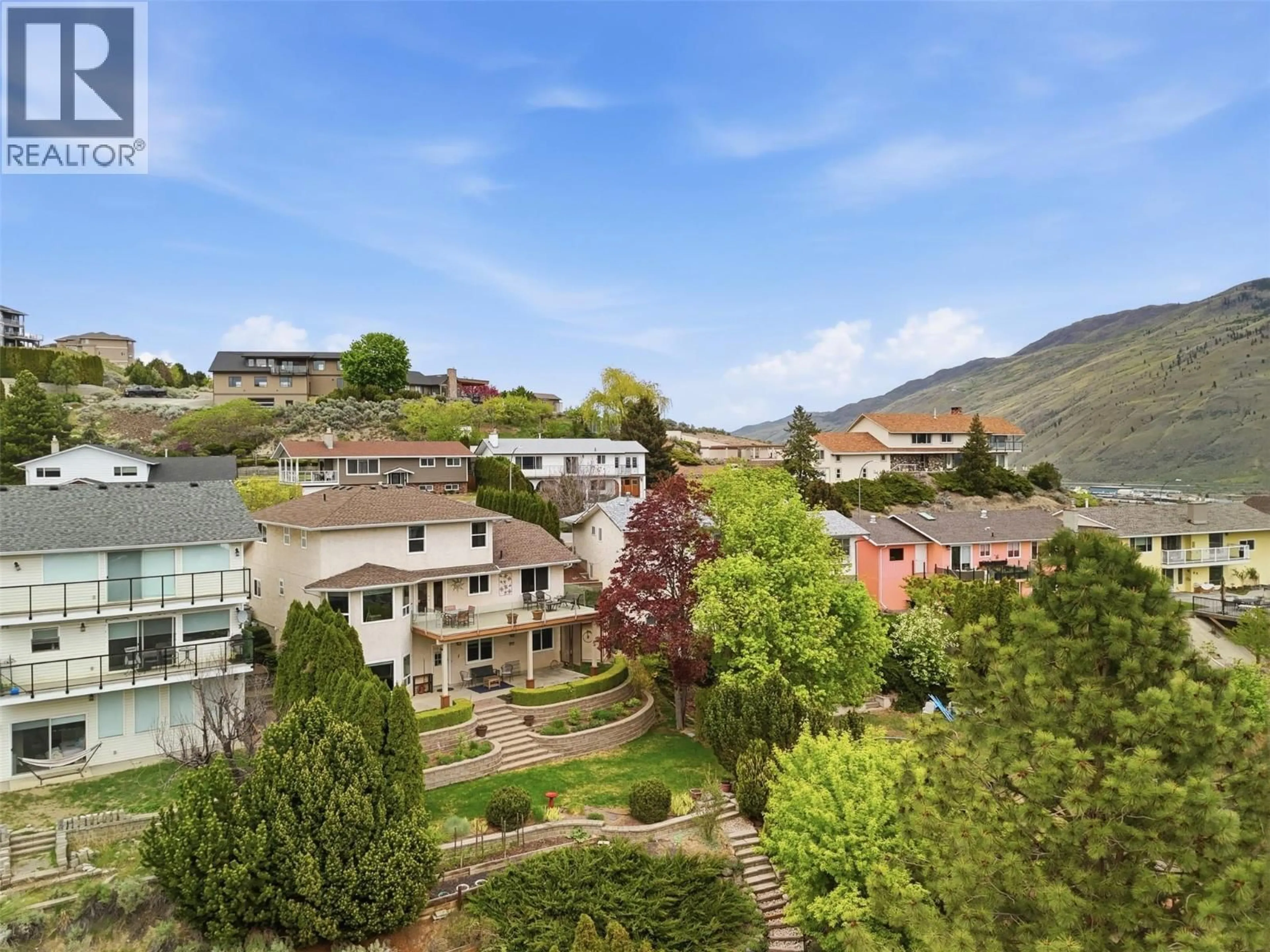 A pic from outside/outdoor area/front of a property/back of a property/a pic from drone, mountain view for 865 NORVIEW ROAD, Kamloops British Columbia V2B7X3