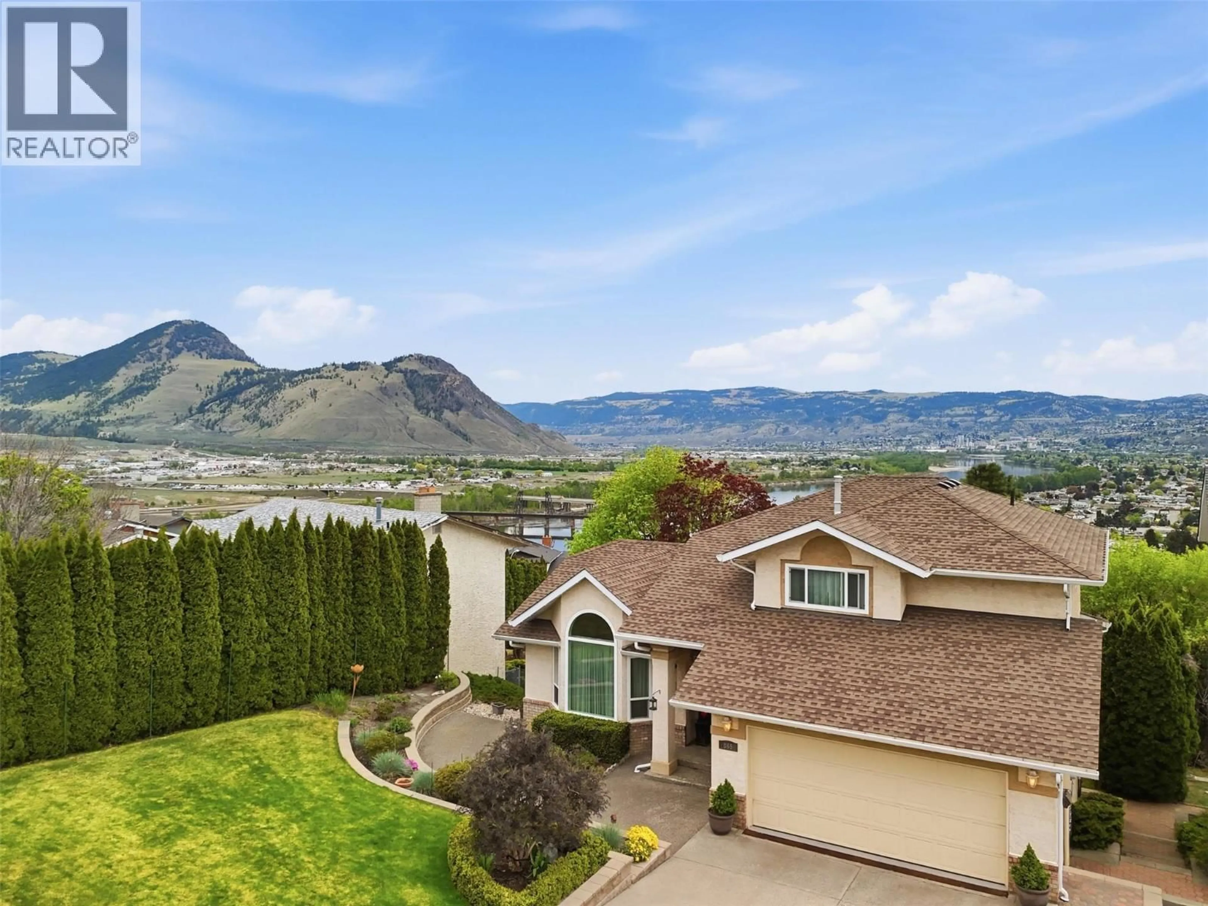 A pic from outside/outdoor area/front of a property/back of a property/a pic from drone, mountain view for 865 NORVIEW ROAD, Kamloops British Columbia V2B7X3