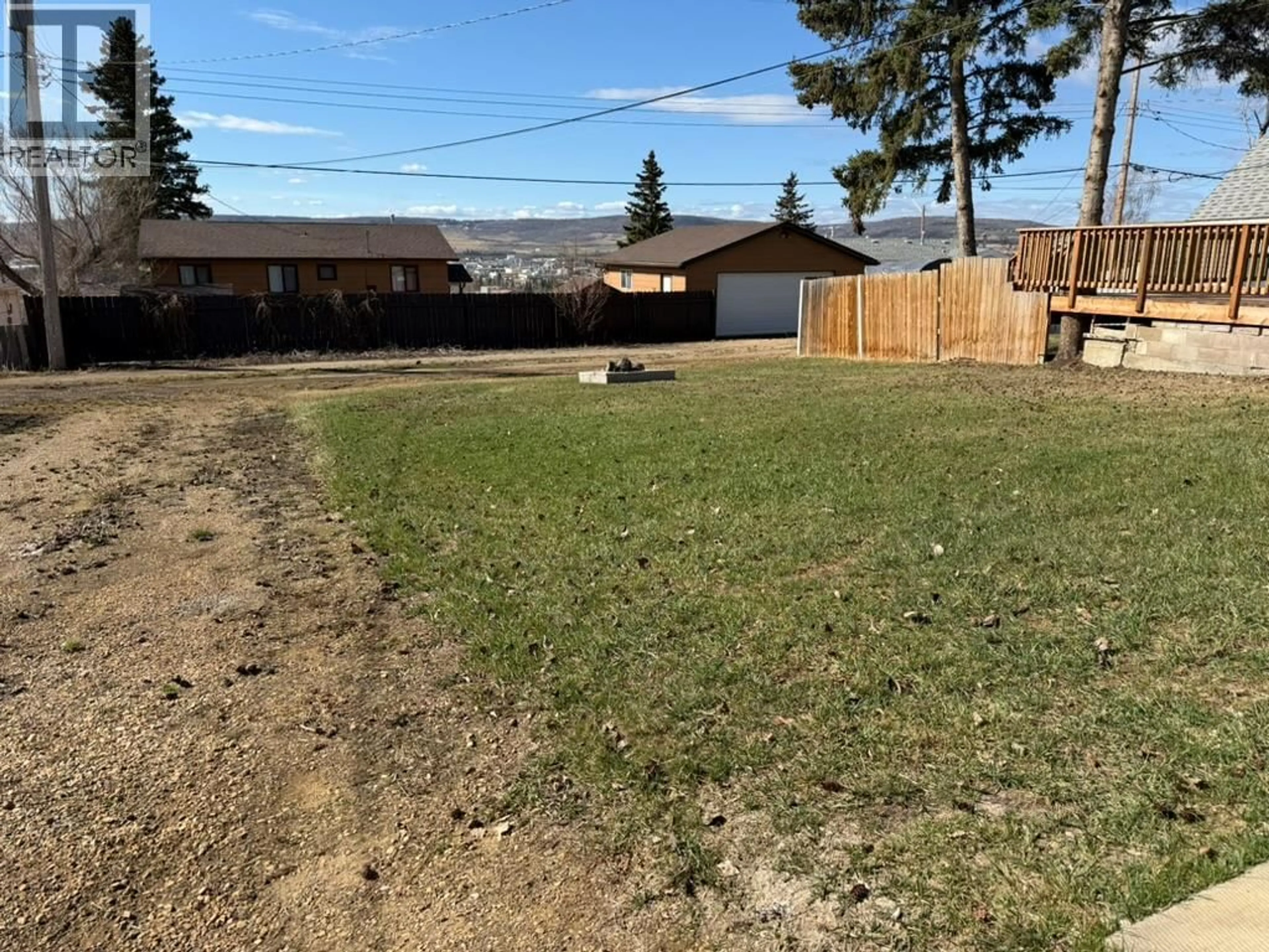 A pic from outside/outdoor area/front of a property/back of a property/a pic from drone, mountain view for 309 100A AVENUE, Dawson Creek British Columbia V1G1X5