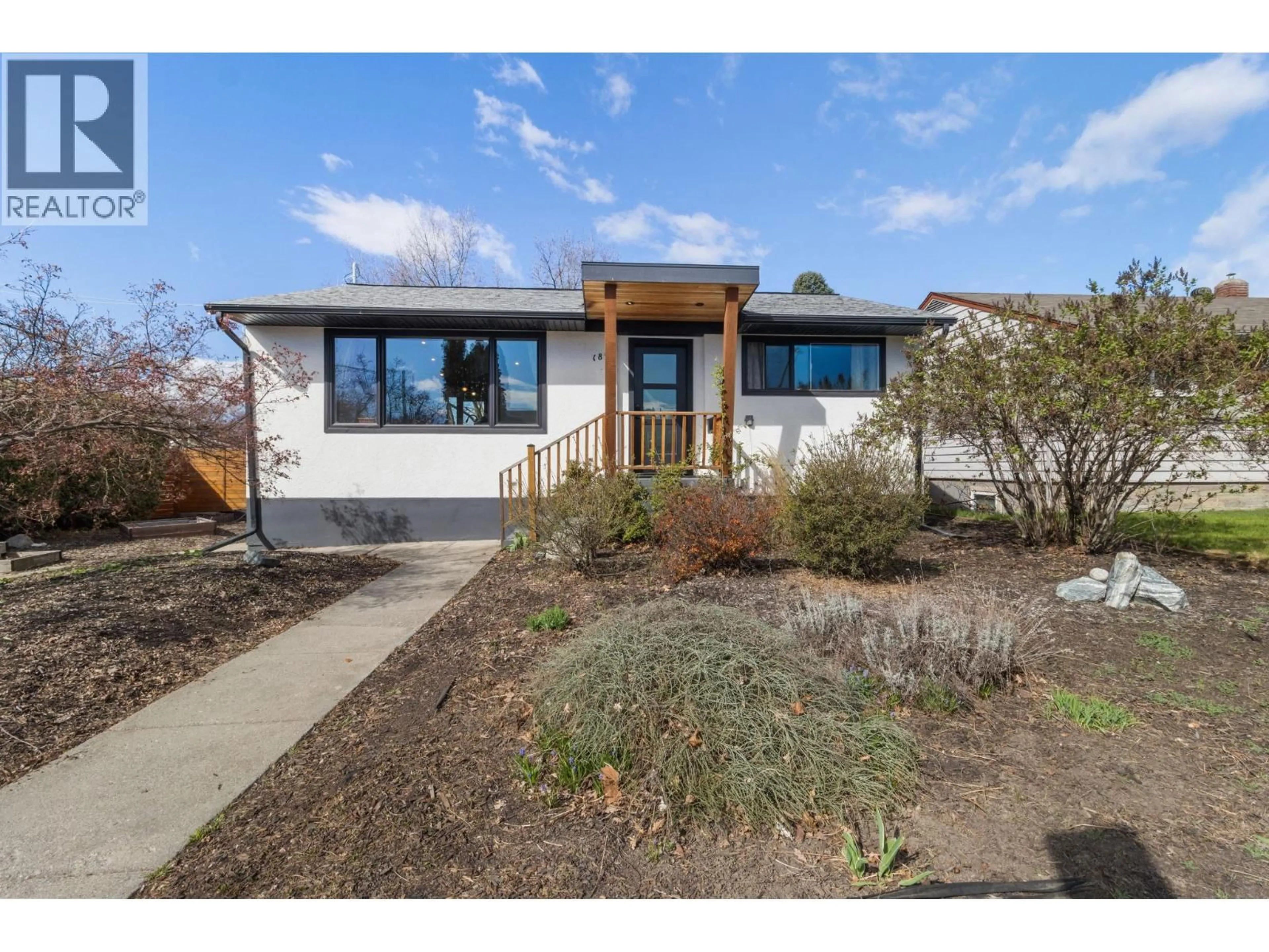 Home with brick exterior material, street for 1892 CARRUTHERS STREET, Kelowna British Columbia V1Y3B6
