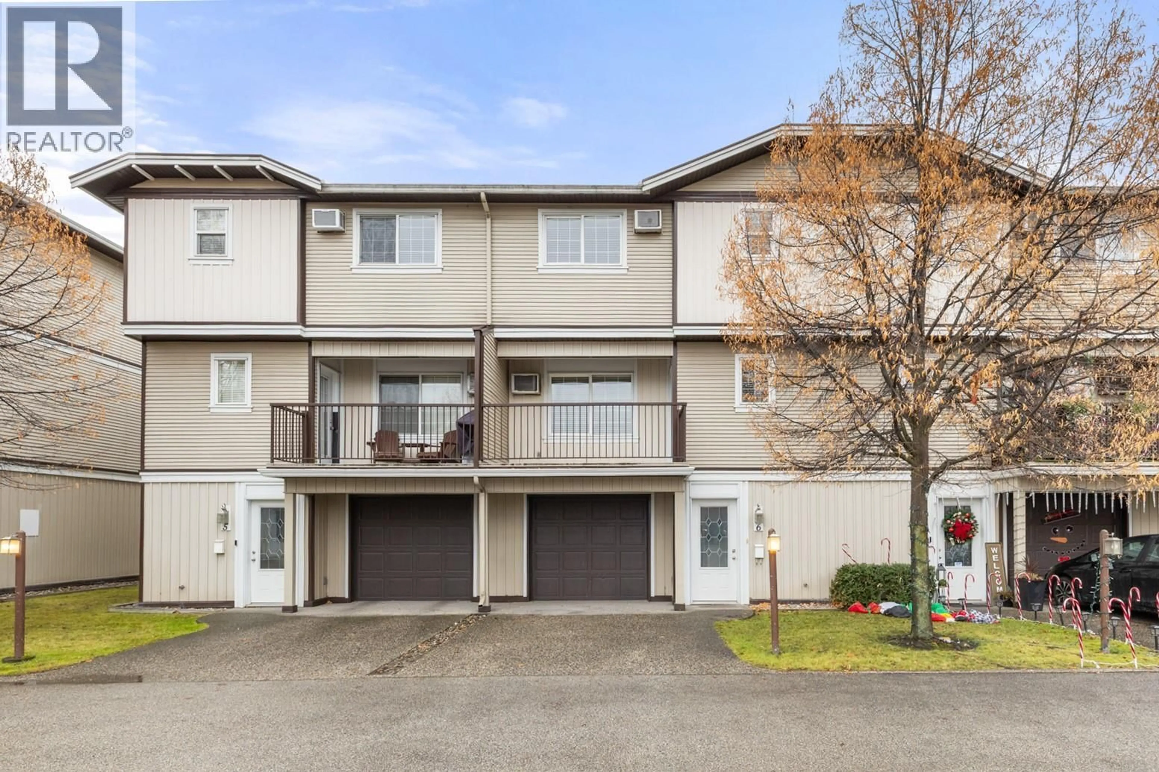 A pic from outside/outdoor area/front of a property/back of a property/a pic from drone, street for 6 - 124 MILLS ROAD, Kelowna British Columbia V1X4G7
