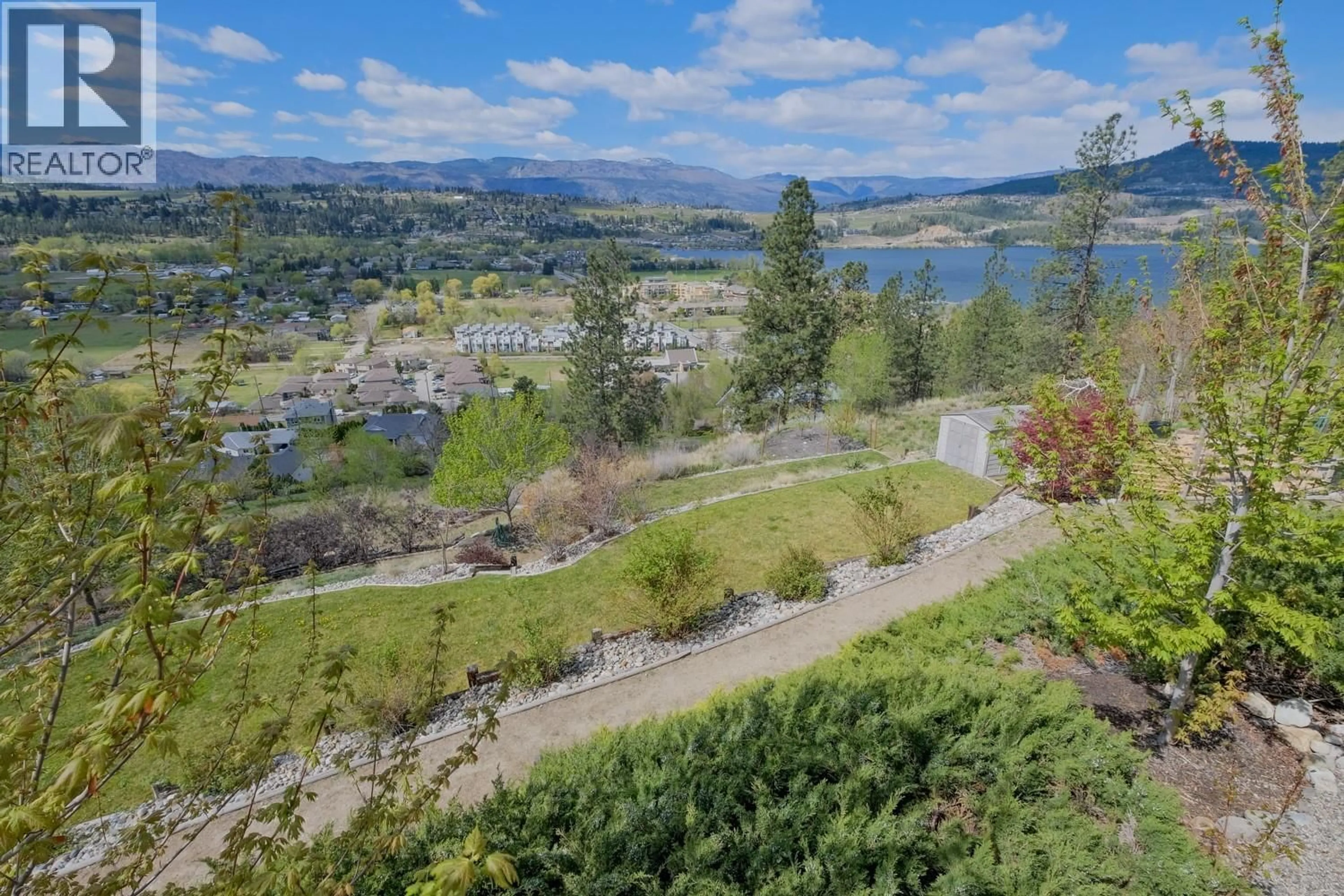 A pic from outside/outdoor area/front of a property/back of a property/a pic from drone, water/lake/river/ocean view for 11420 DARLENE ROAD, Lake Country British Columbia V4V1Y4