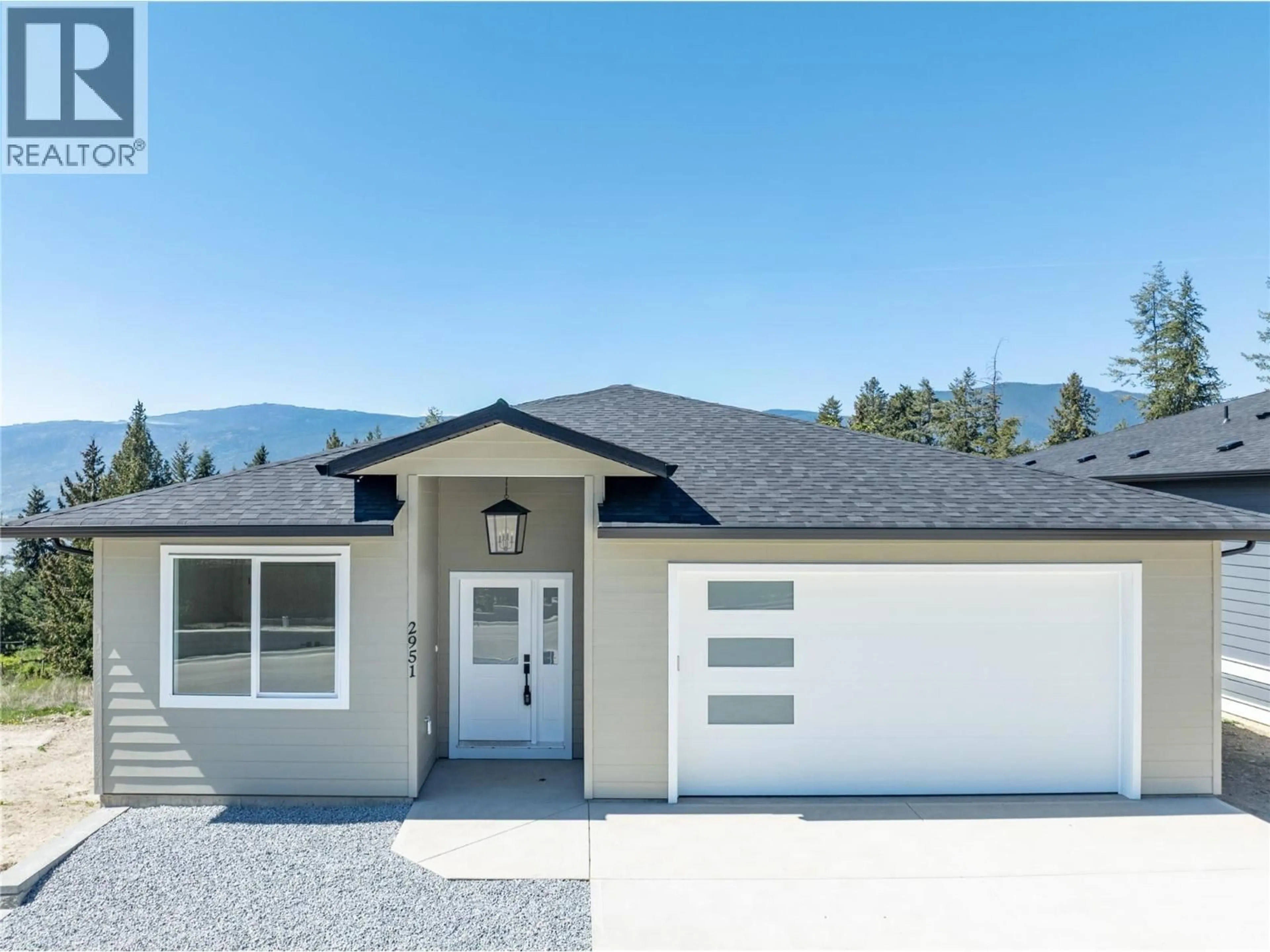 Home with vinyl exterior material, mountain view for 2951 27 STREET NORTHEAST, Salmon Arm British Columbia V1E2Z7