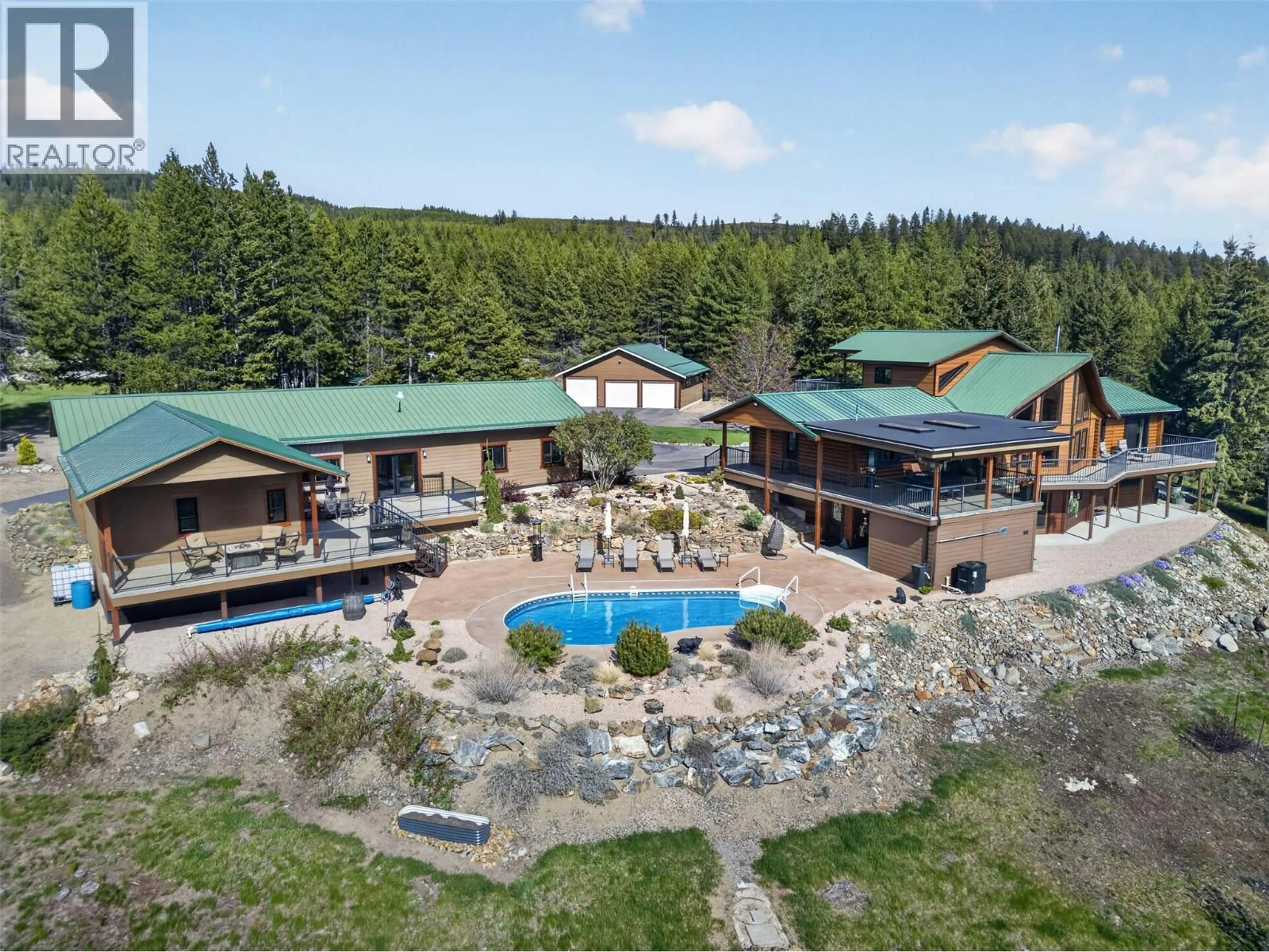 A pic from outside/outdoor area/front of a property/back of a property/a pic from drone, unknown for 7319 TRAPPER COURT, Kelowna British Columbia V1P1H7