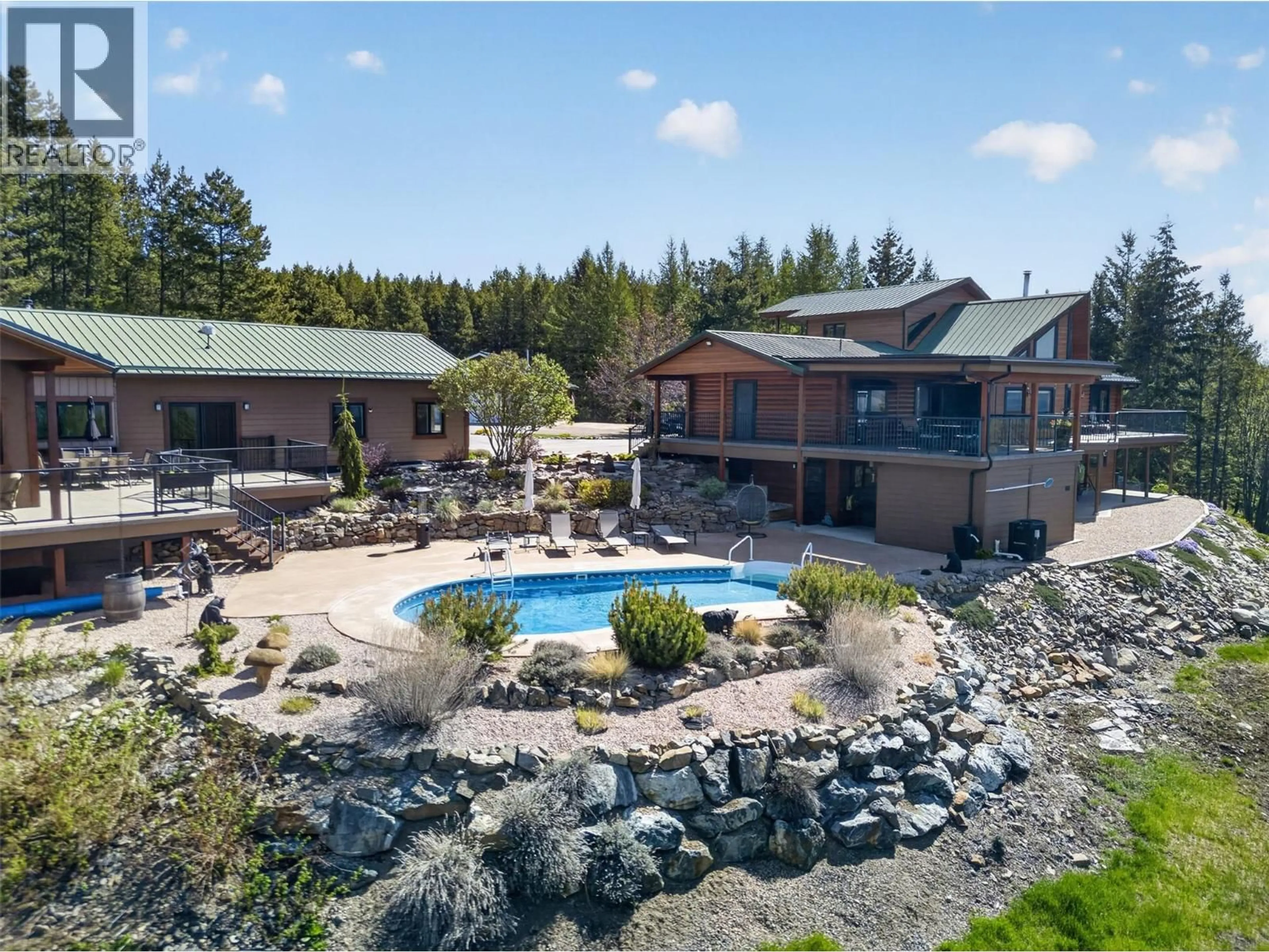 A pic from outside/outdoor area/front of a property/back of a property/a pic from drone, water/lake/river/ocean view for 7319 TRAPPER COURT, Kelowna British Columbia V1P1H7