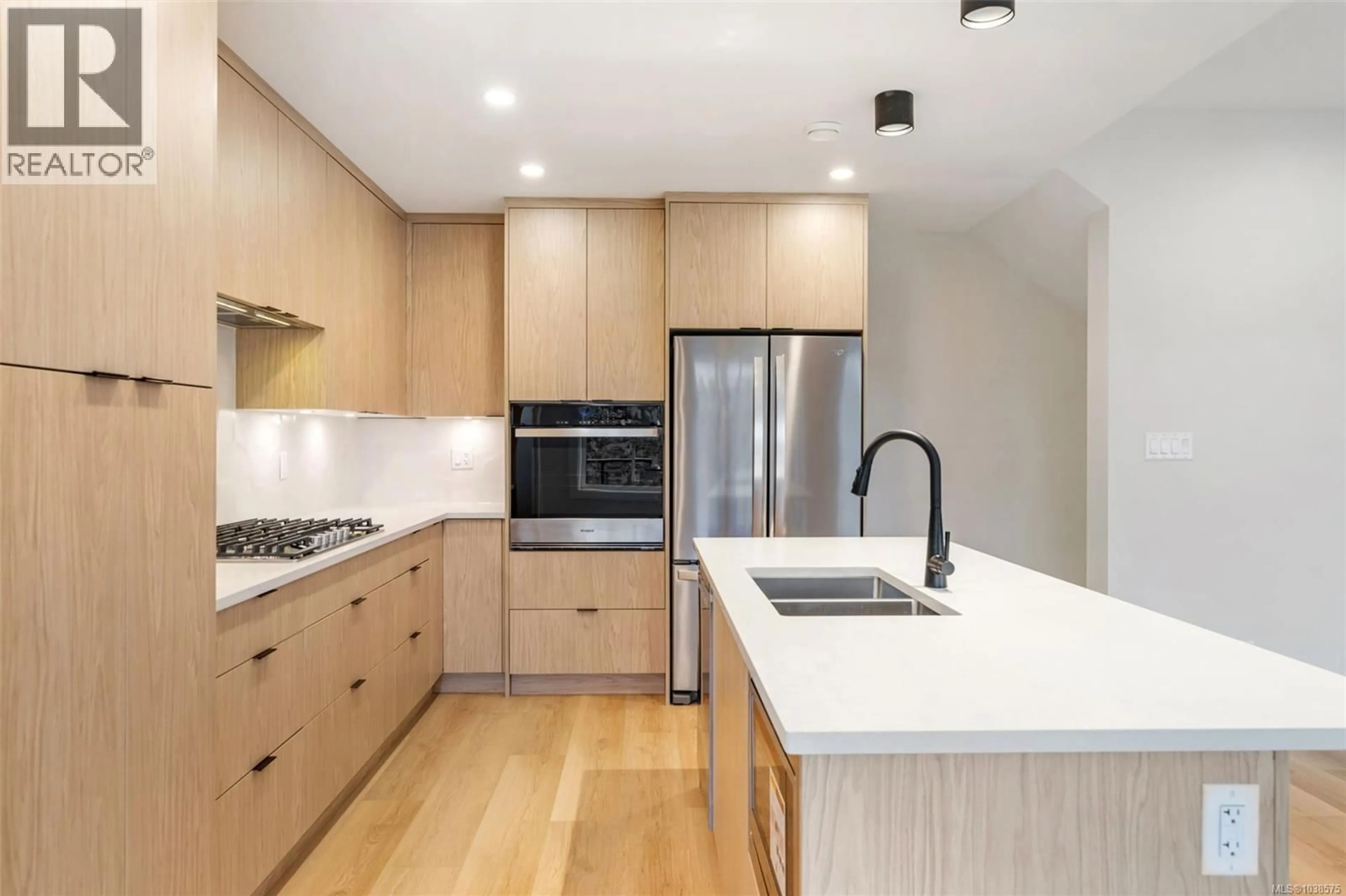 Contemporary kitchen, wood/laminate floor for 2512 BRONZITE PLACE, Langford British Columbia V9B7E2