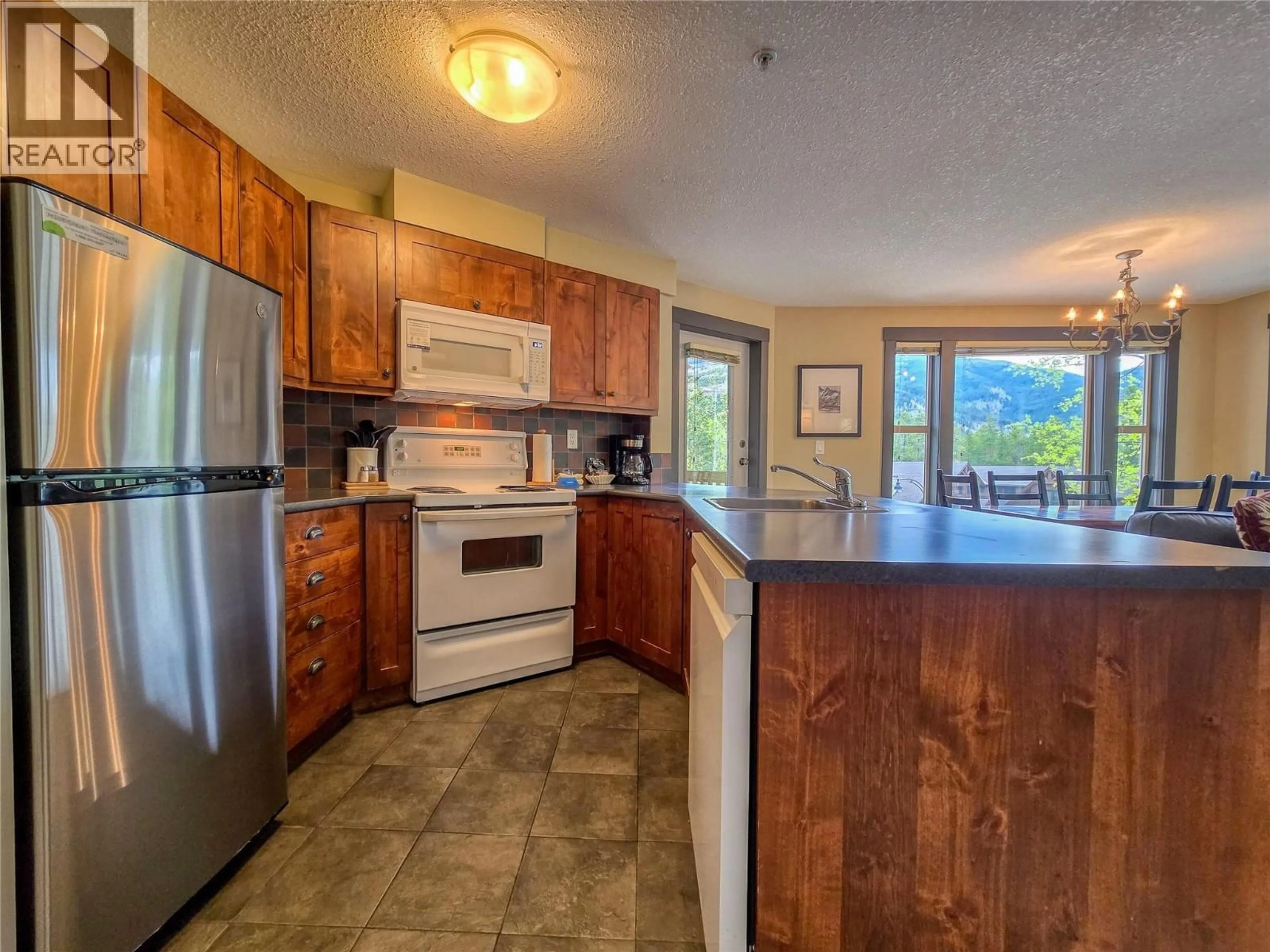 Open concept kitchen, unknown for 308 - 2070 SUMMIT DRIVE, Panorama British Columbia V0A1T0