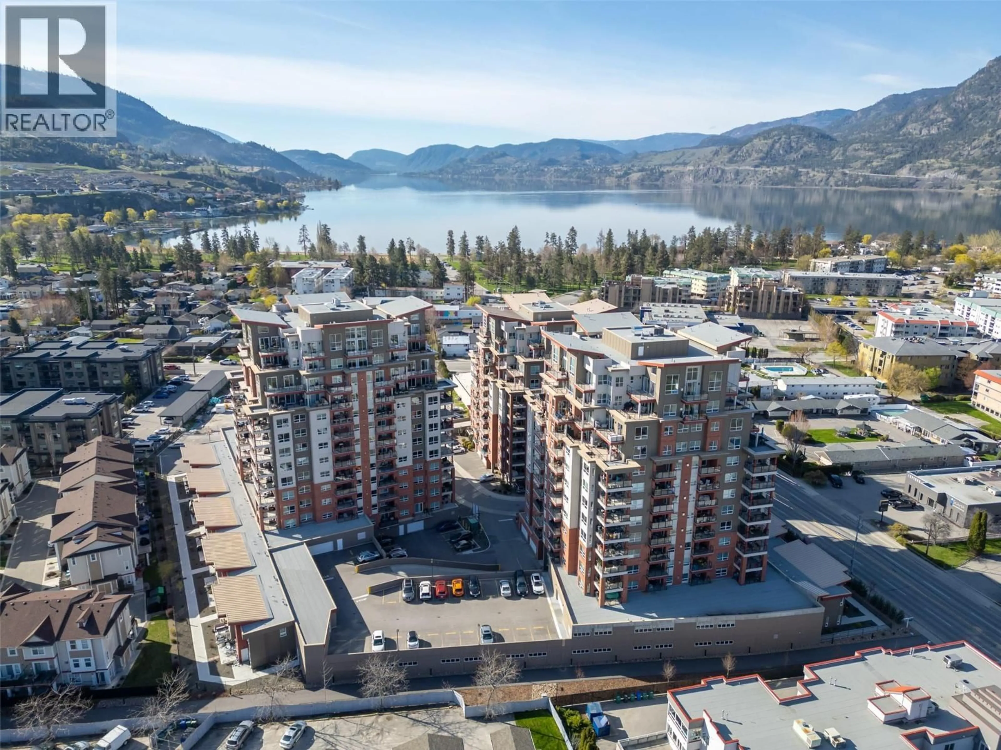 A pic from outside/outdoor area/front of a property/back of a property/a pic from drone, water/lake/river/ocean view for 703 - 3346 SKAHA LAKE ROAD, Penticton British Columbia V2A0H6