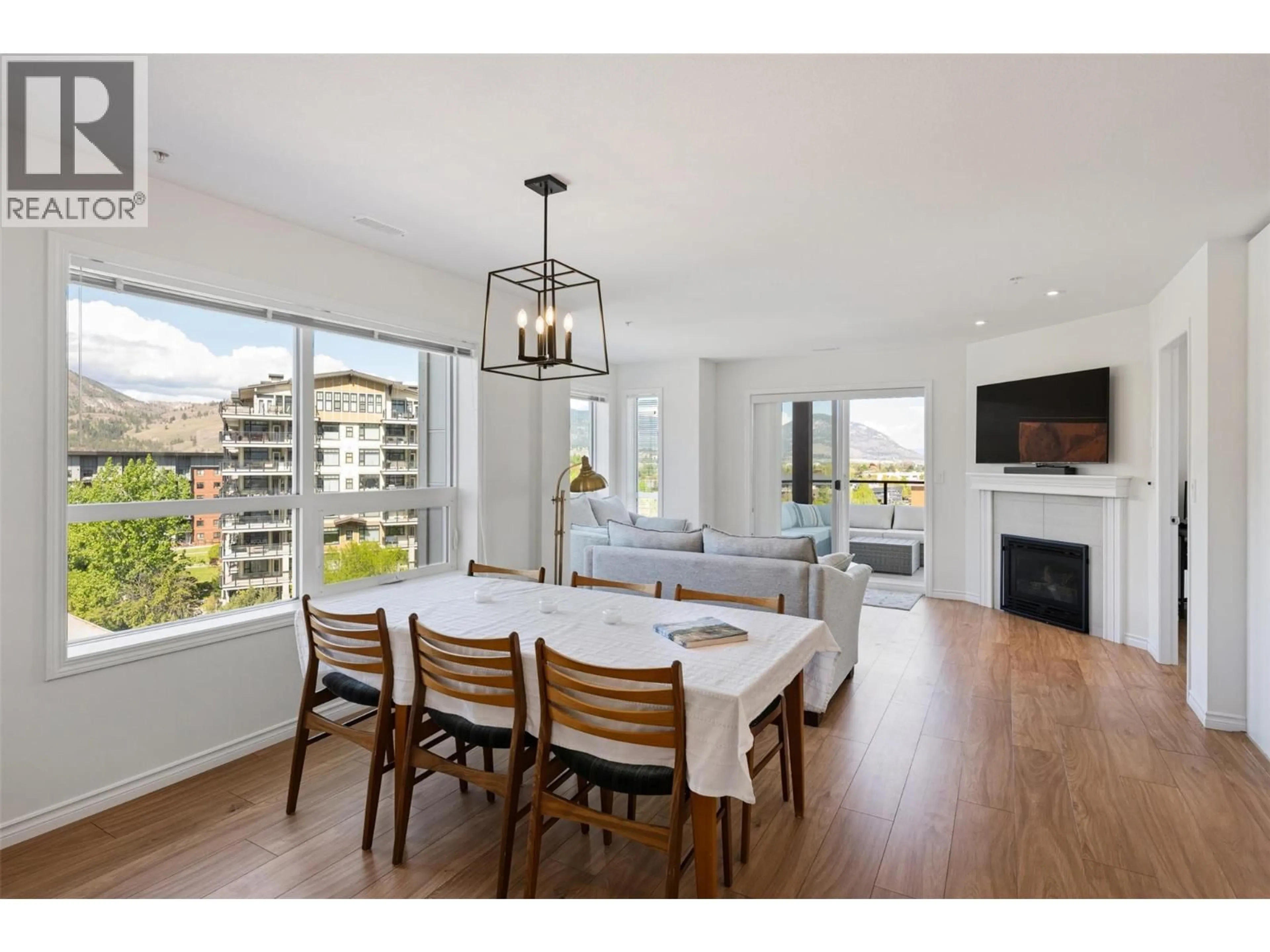 Dining room, wood/laminate floor for 703 - 3346 SKAHA LAKE ROAD, Penticton British Columbia V2A0H6