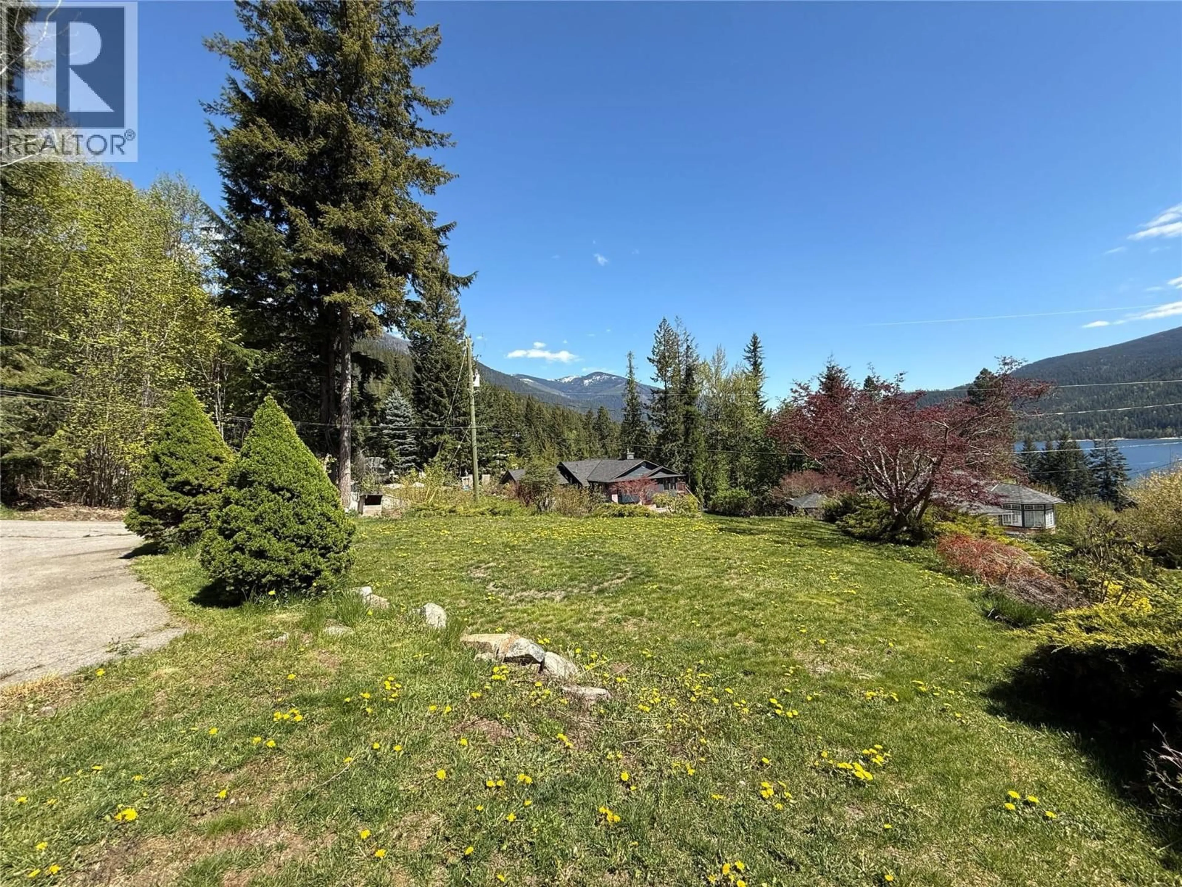 A pic from outside/outdoor area/front of a property/back of a property/a pic from drone, forest/trees view for 3461 BODARD ROAD, Nelson British Columbia V1L6T3