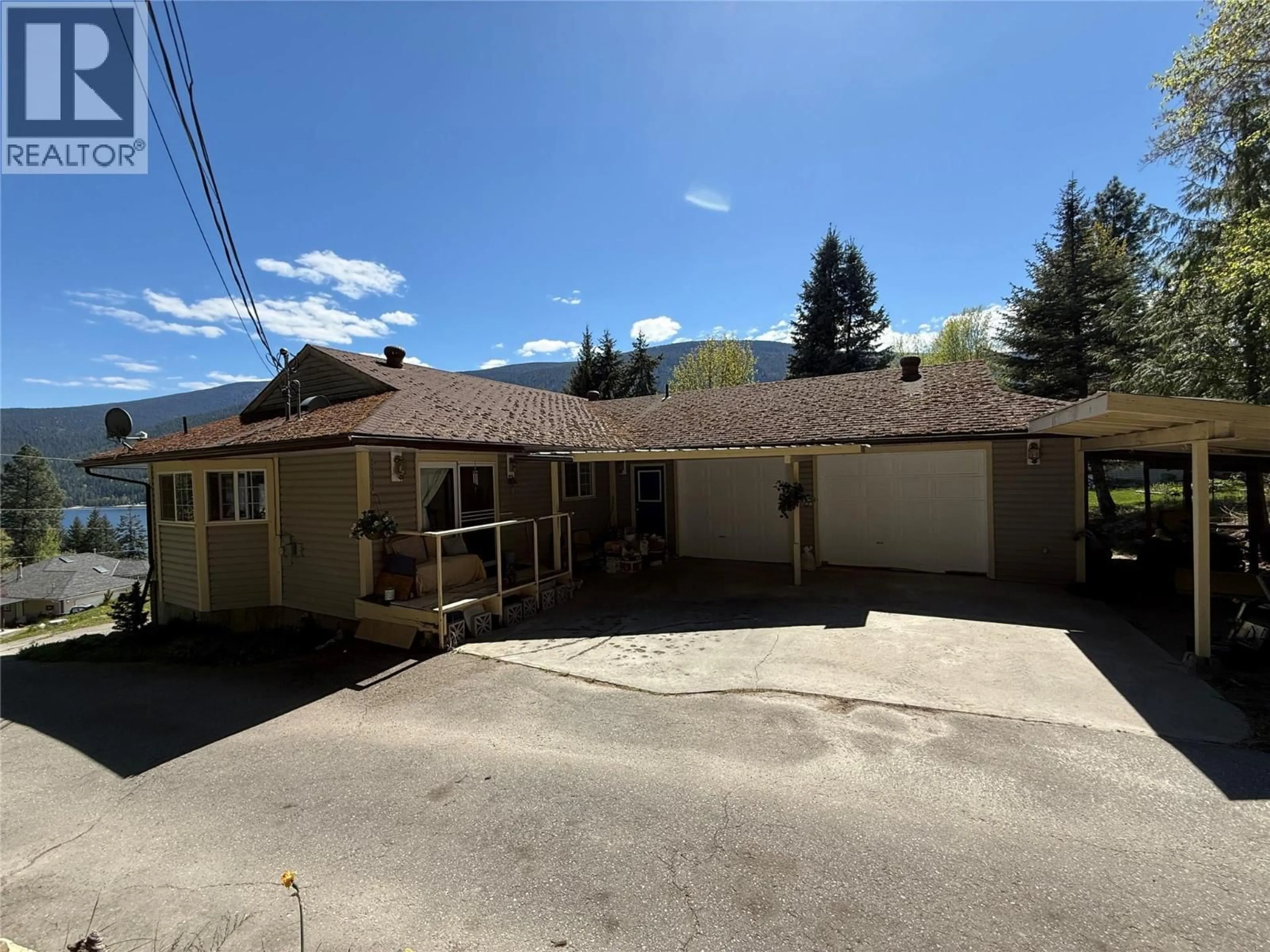 A pic from outside/outdoor area/front of a property/back of a property/a pic from drone, mountain view for 3461 BODARD ROAD, Nelson British Columbia V1L6T3