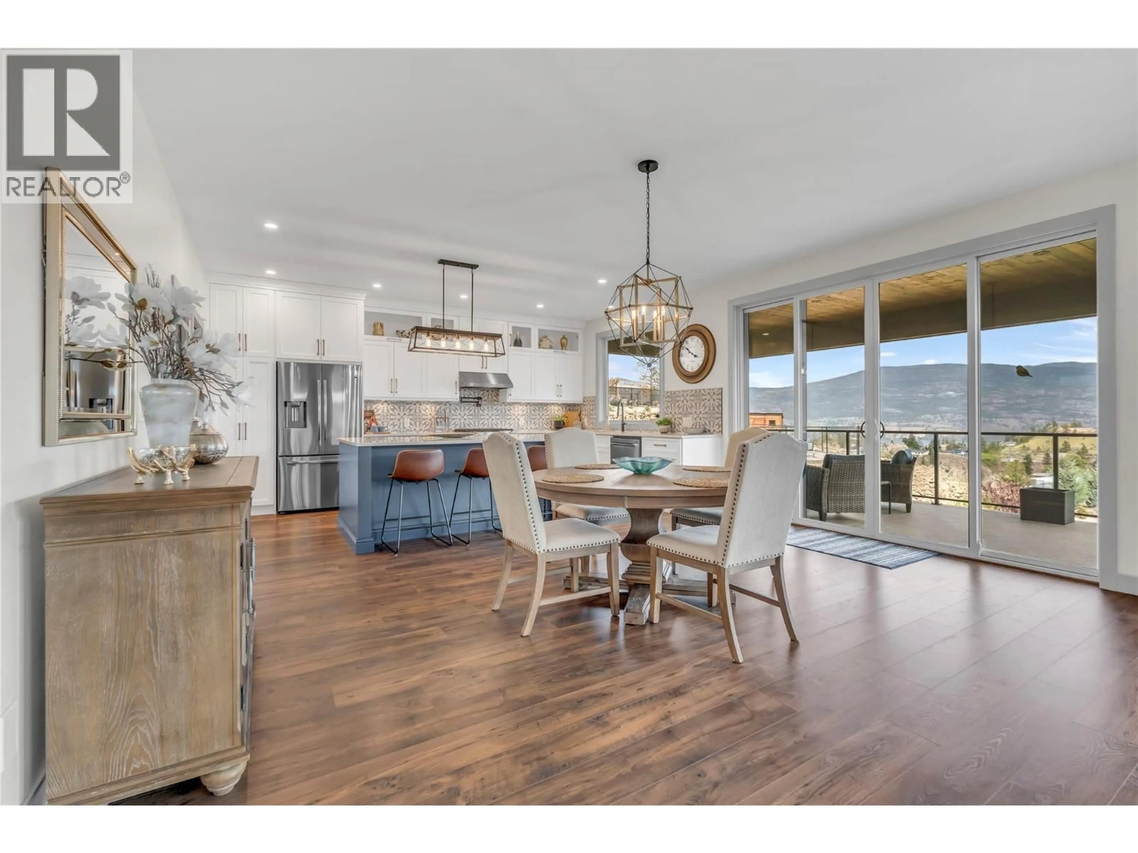Open concept kitchen, wood/laminate floor for 17439 SANBORN STREET, Summerland British Columbia V0H1Z3