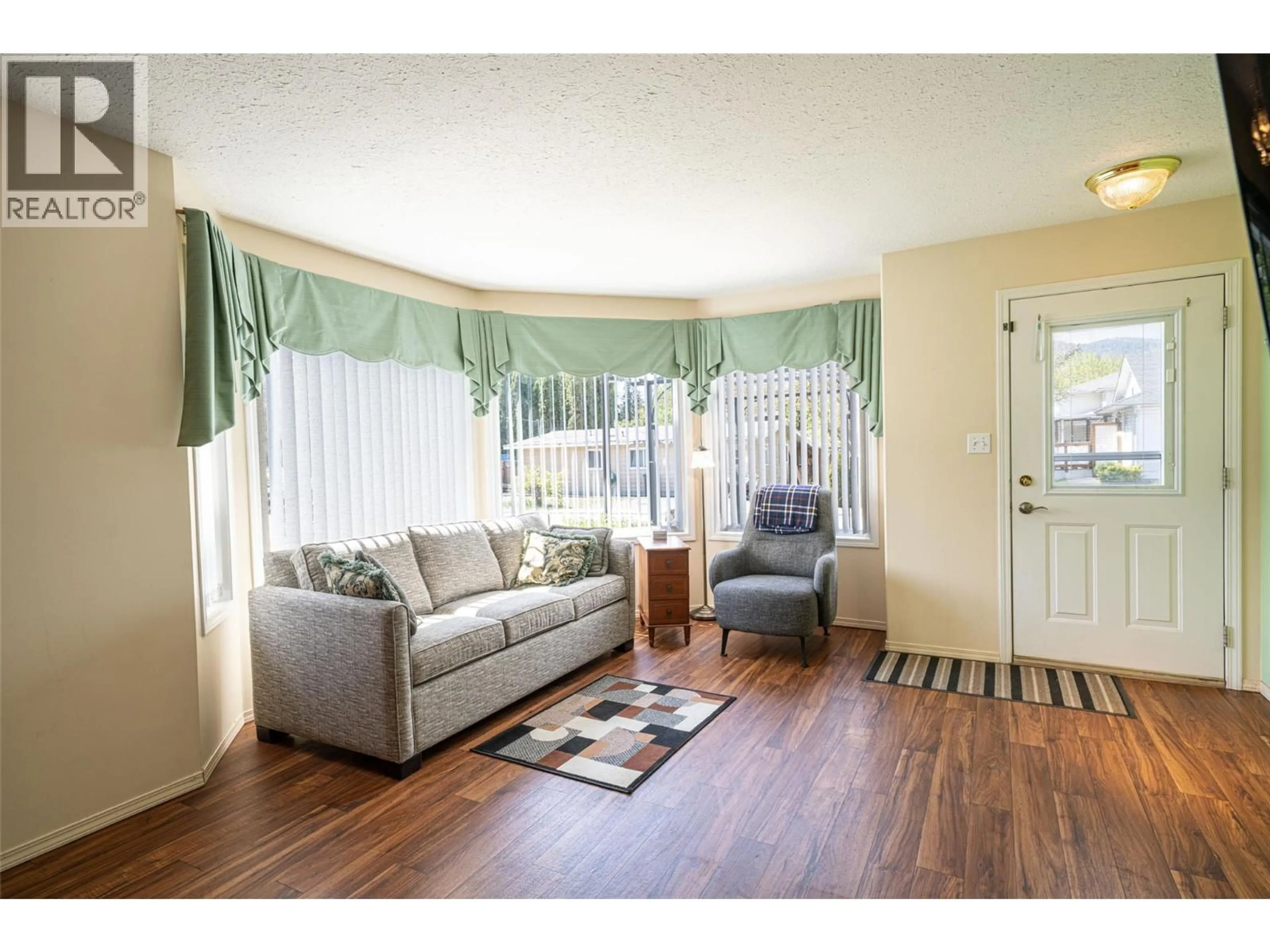 Living room with furniture, unknown for 1 - 2716 WOLFENDEN TERRACE, Armstrong British Columbia V4Y2A6