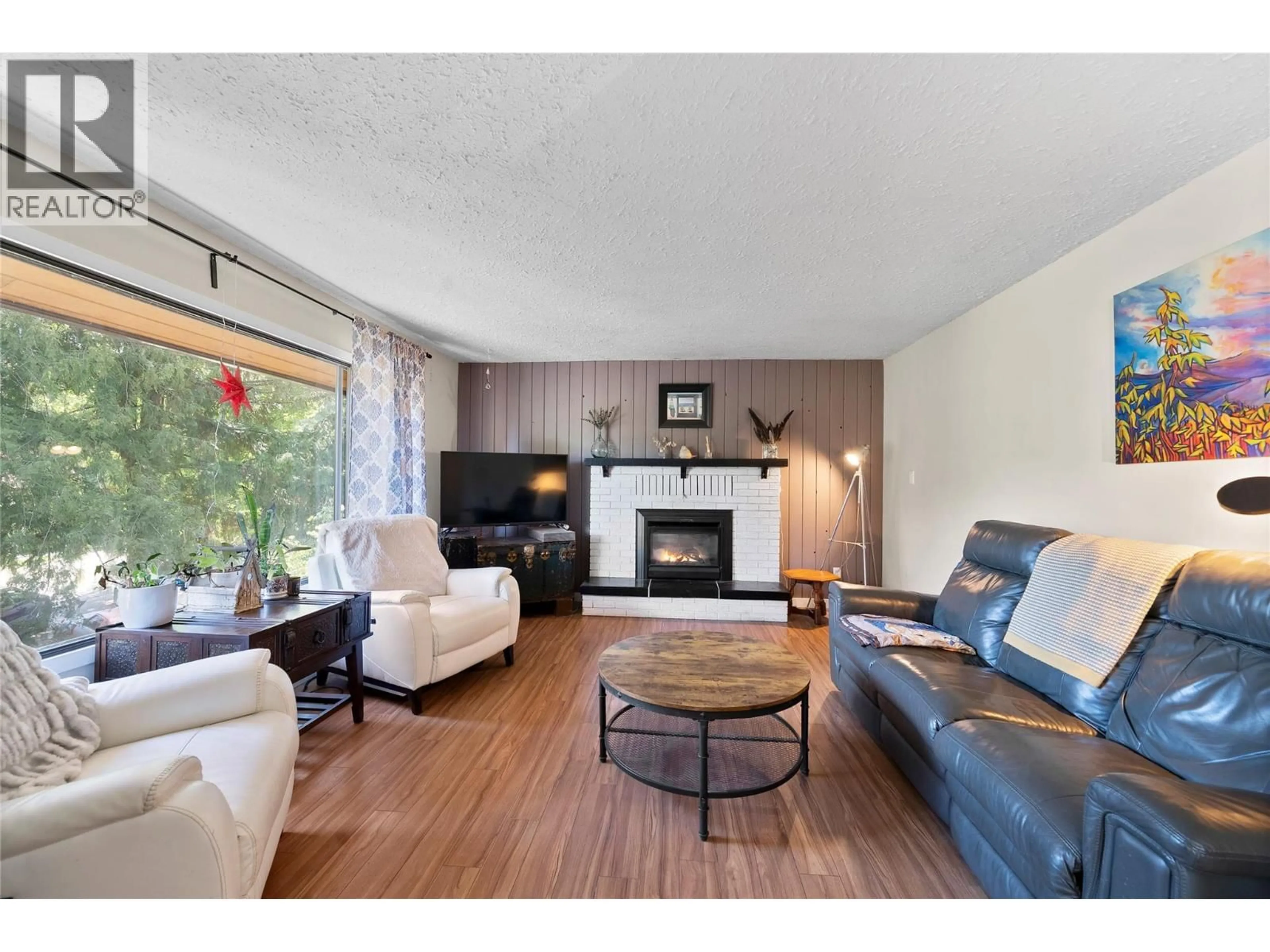 Living room with furniture, wood/laminate floor for 2499 RIDGEVIEW PLACE, Blind Bay British Columbia V0E1H2