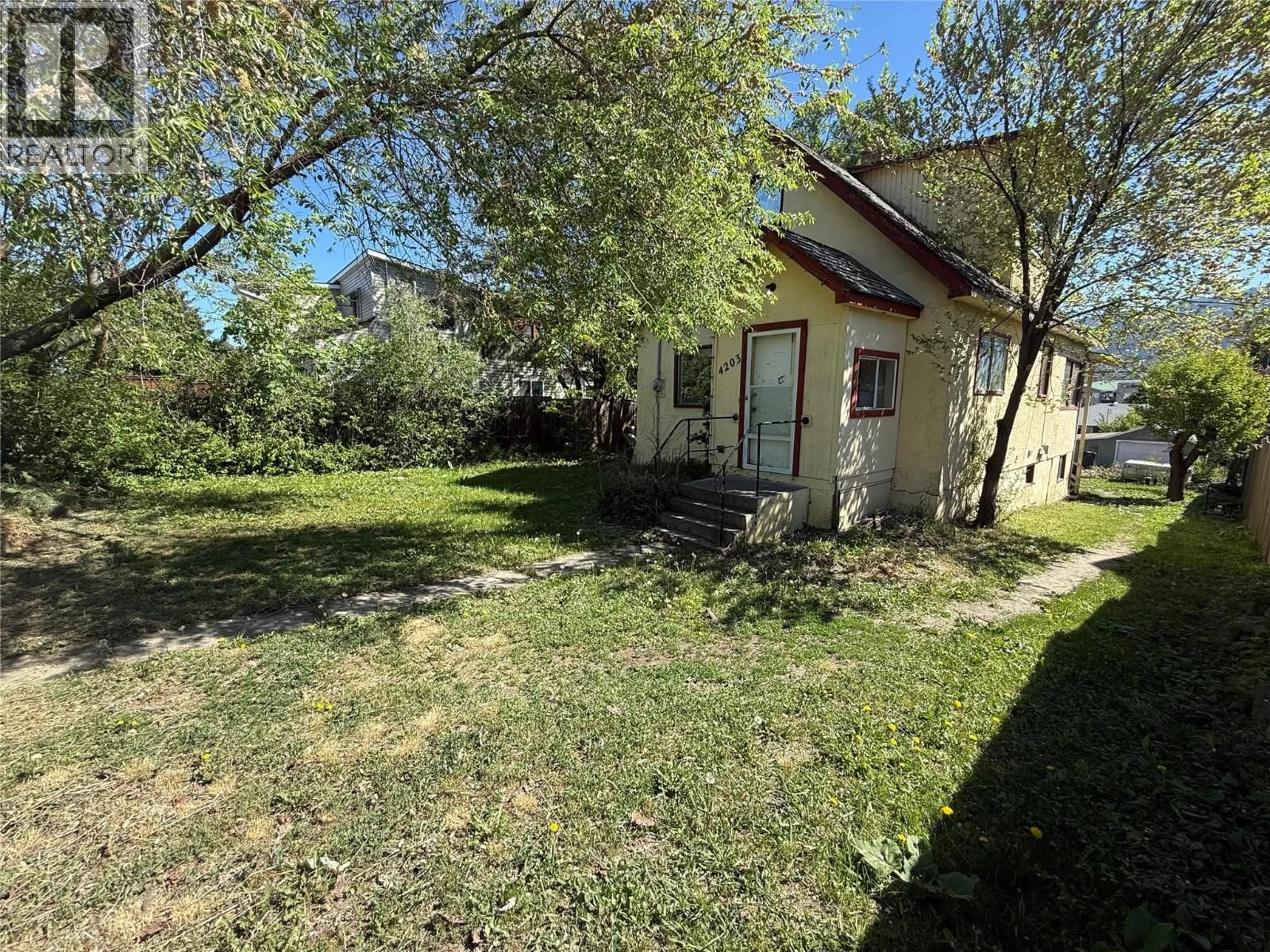 A pic from outside/outdoor area/front of a property/back of a property/a pic from drone, street for 4203 34 STREET, Vernon British Columbia v1b3a7
