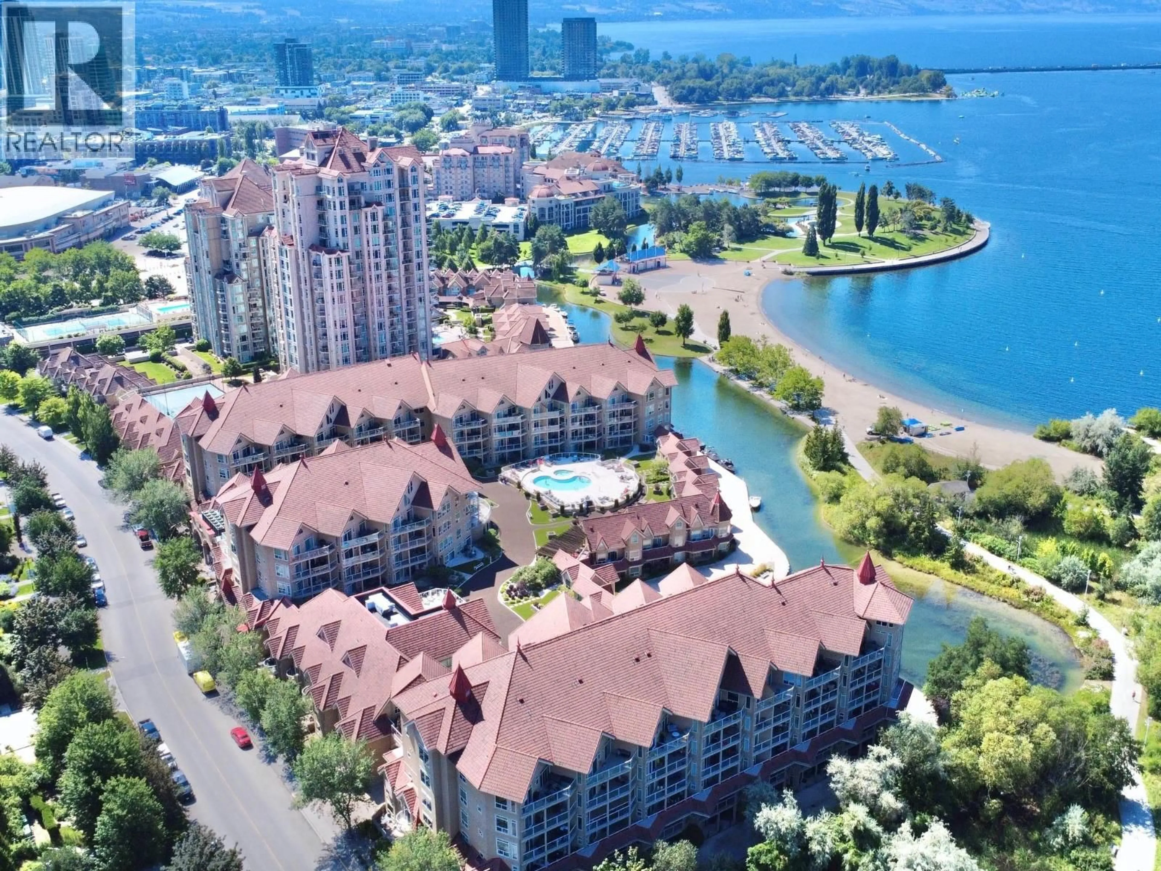 A pic from outside/outdoor area/front of a property/back of a property/a pic from drone, water/lake/river/ocean view for 410 - 1088 SUNSET DRIVE, Kelowna British Columbia V1Y9W1