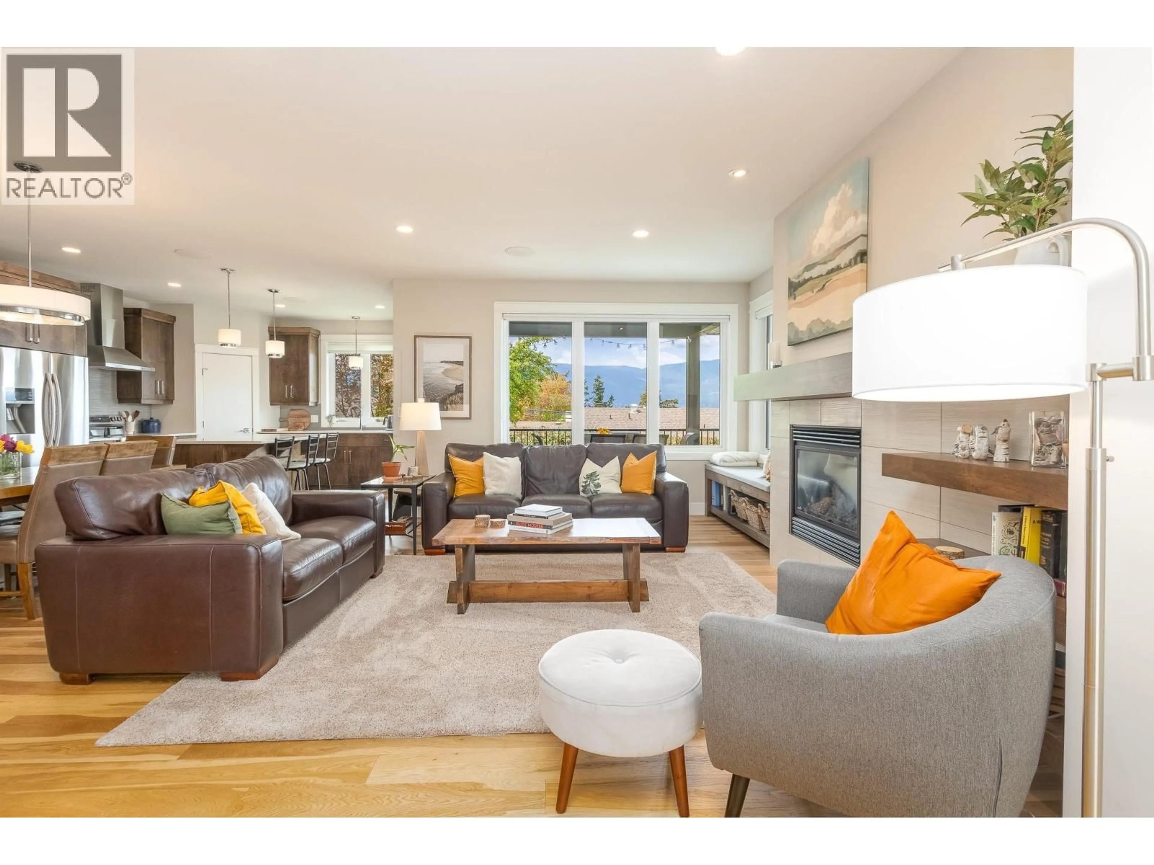 Living room with furniture, wood/laminate floor for 461 21 STREET SOUTHEAST, Salmon Arm British Columbia V1E1K5