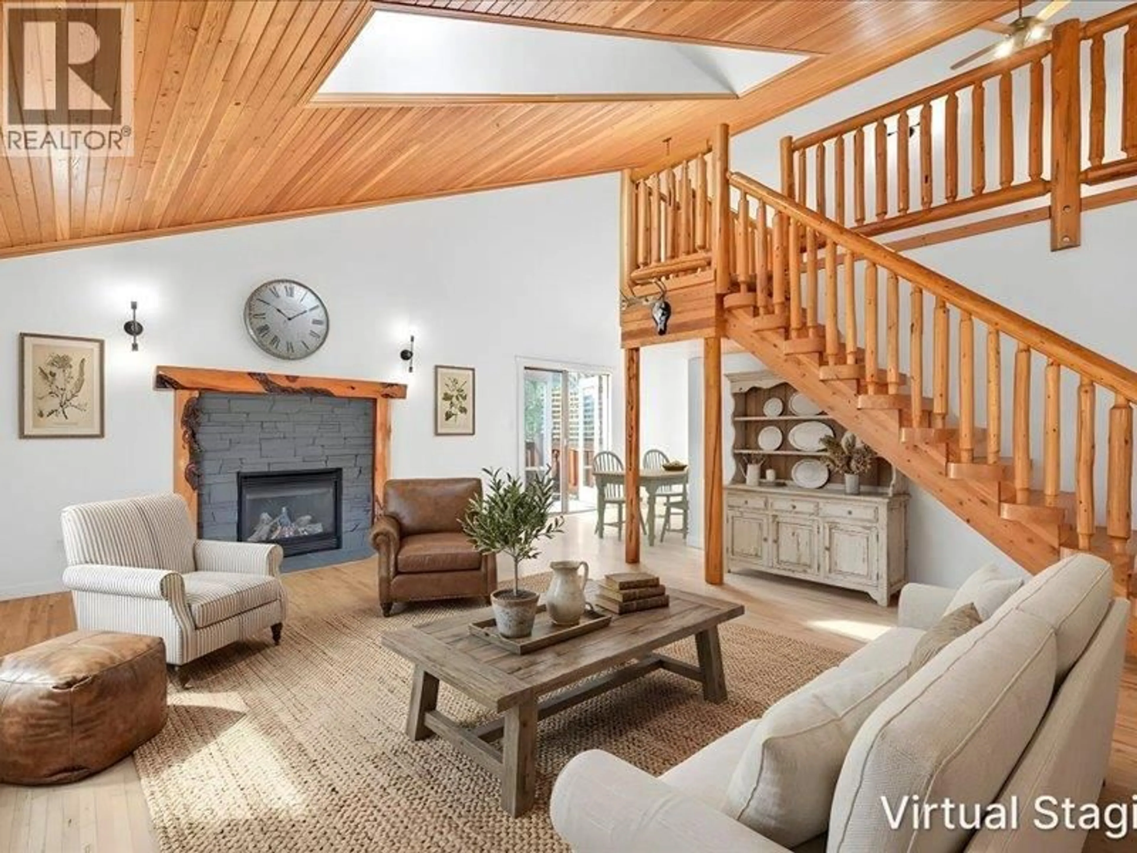 Living room with furniture, wood/laminate floor for 4C SPRUCE PLACE, Fernie British Columbia V0B1M4