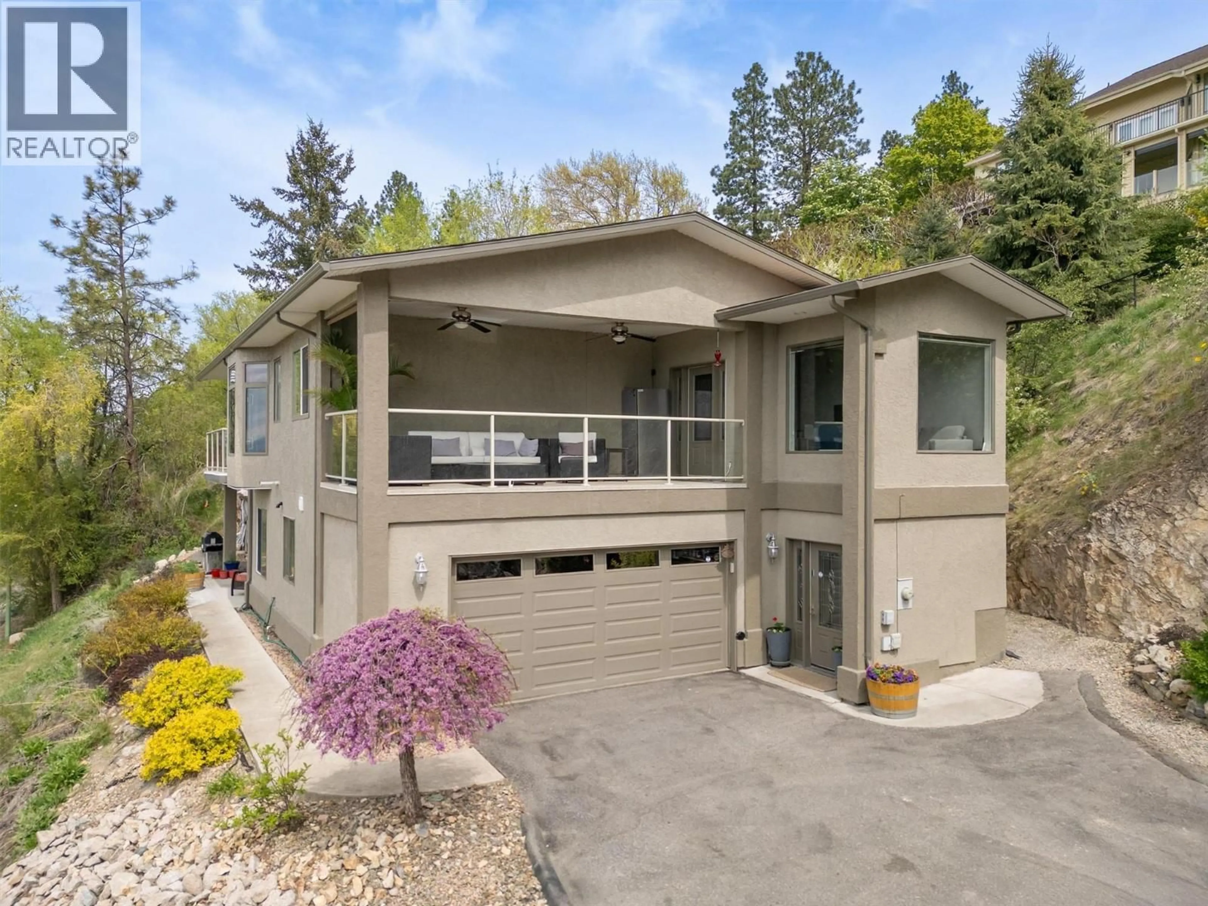 Home with vinyl exterior material, street for 1027 JAMES HOCKEY PLACE, Kelowna British Columbia V1X7L2