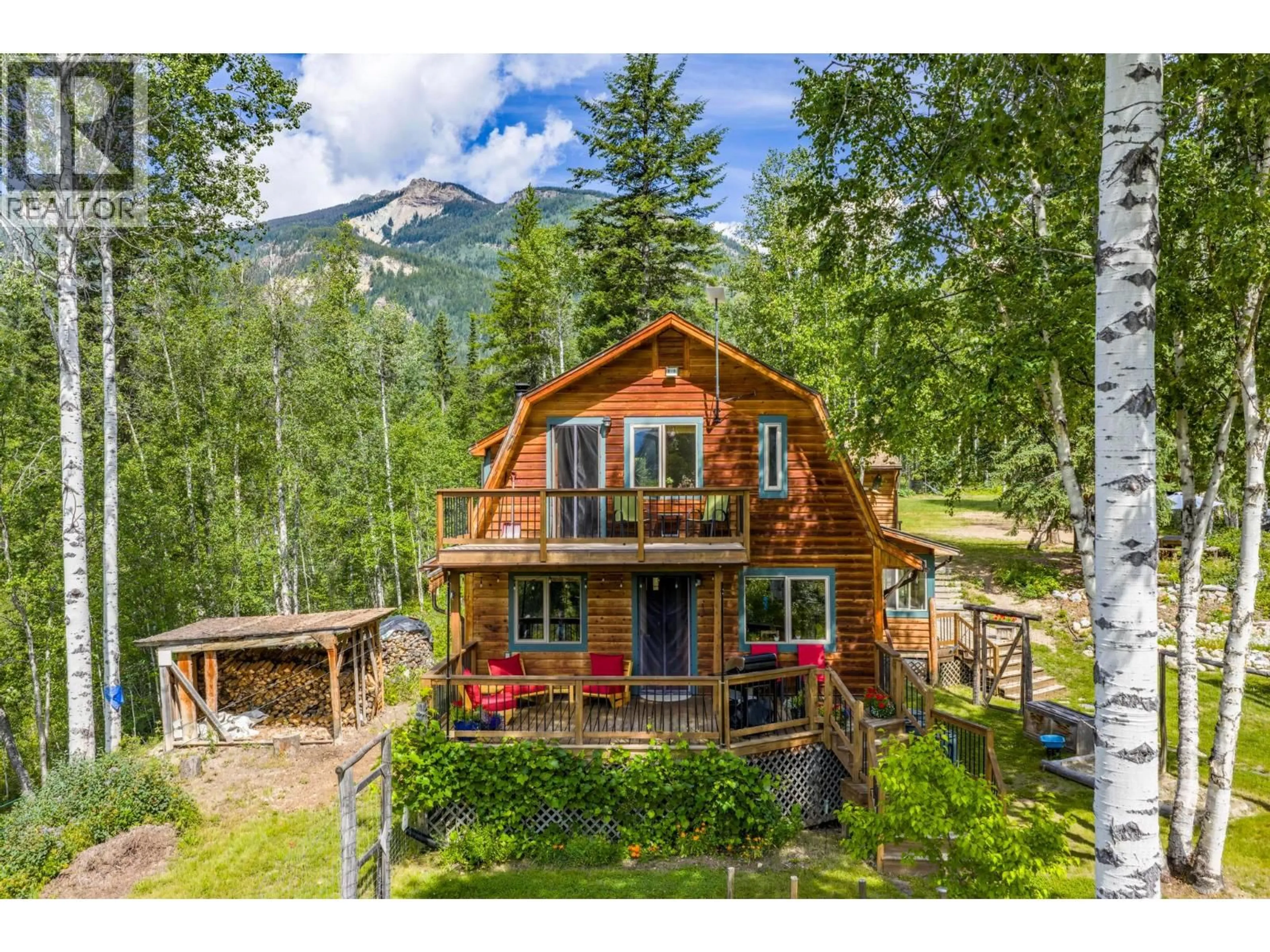 A pic from outside/outdoor area/front of a property/back of a property/a pic from drone, mountain view for 2487 SEWARD RD OTHER, Golden British Columbia V0A1H1
