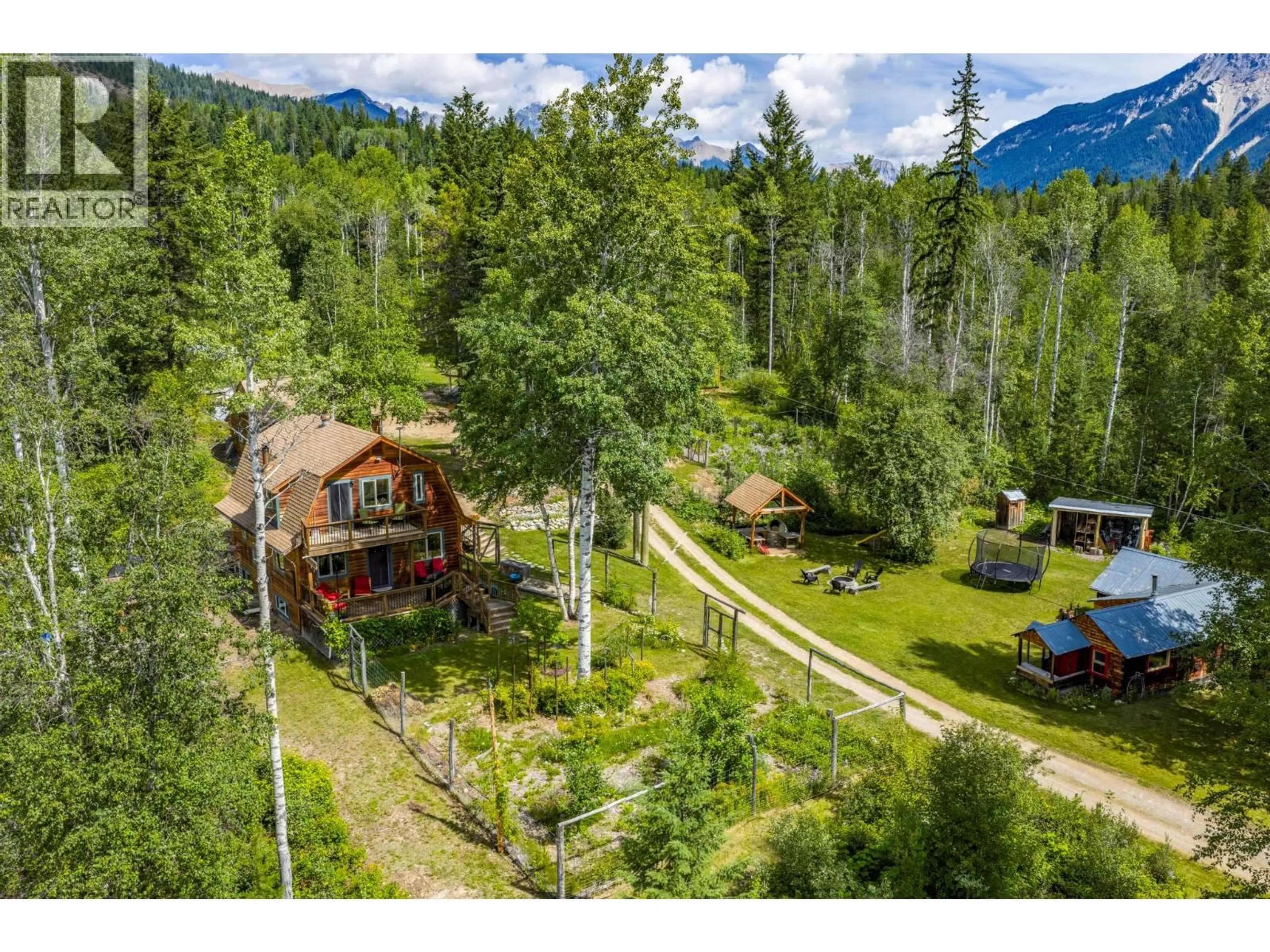 A pic from outside/outdoor area/front of a property/back of a property/a pic from drone, mountain view for 2487 SEWARD RD OTHER, Golden British Columbia V0A1H1