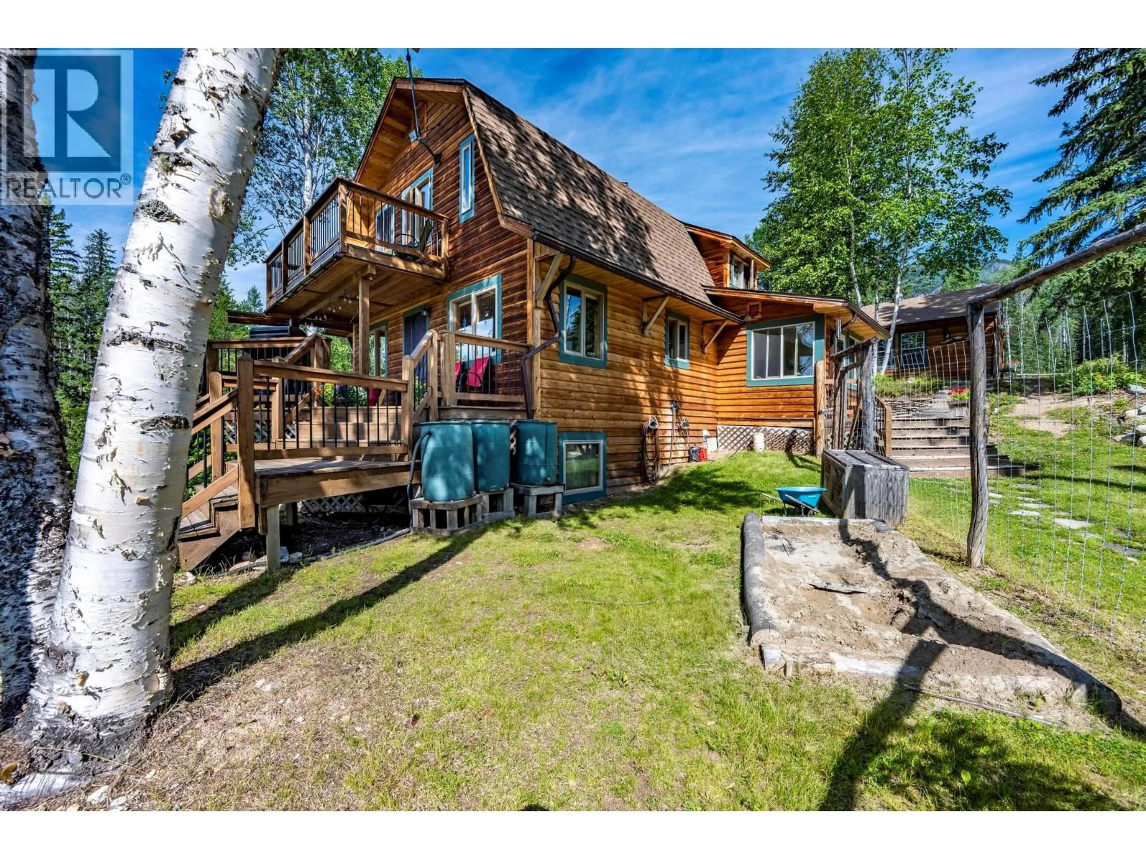 A pic from outside/outdoor area/front of a property/back of a property/a pic from drone, unknown for 2487 SEWARD RD OTHER, Golden British Columbia V0A1H1