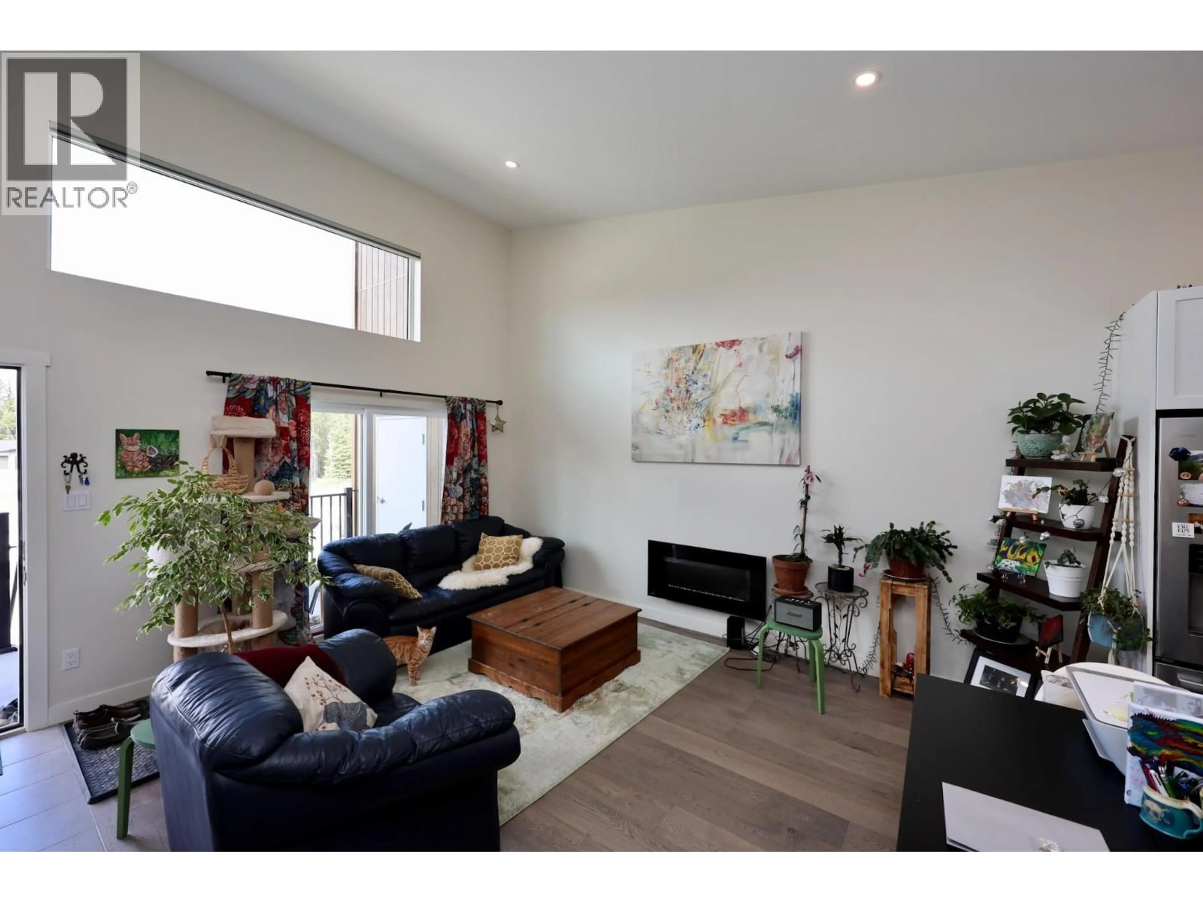 Living room with furniture, wood/laminate floor for 11 - 1512 GRANITE DRIVE, Golden British Columbia V0A1H3