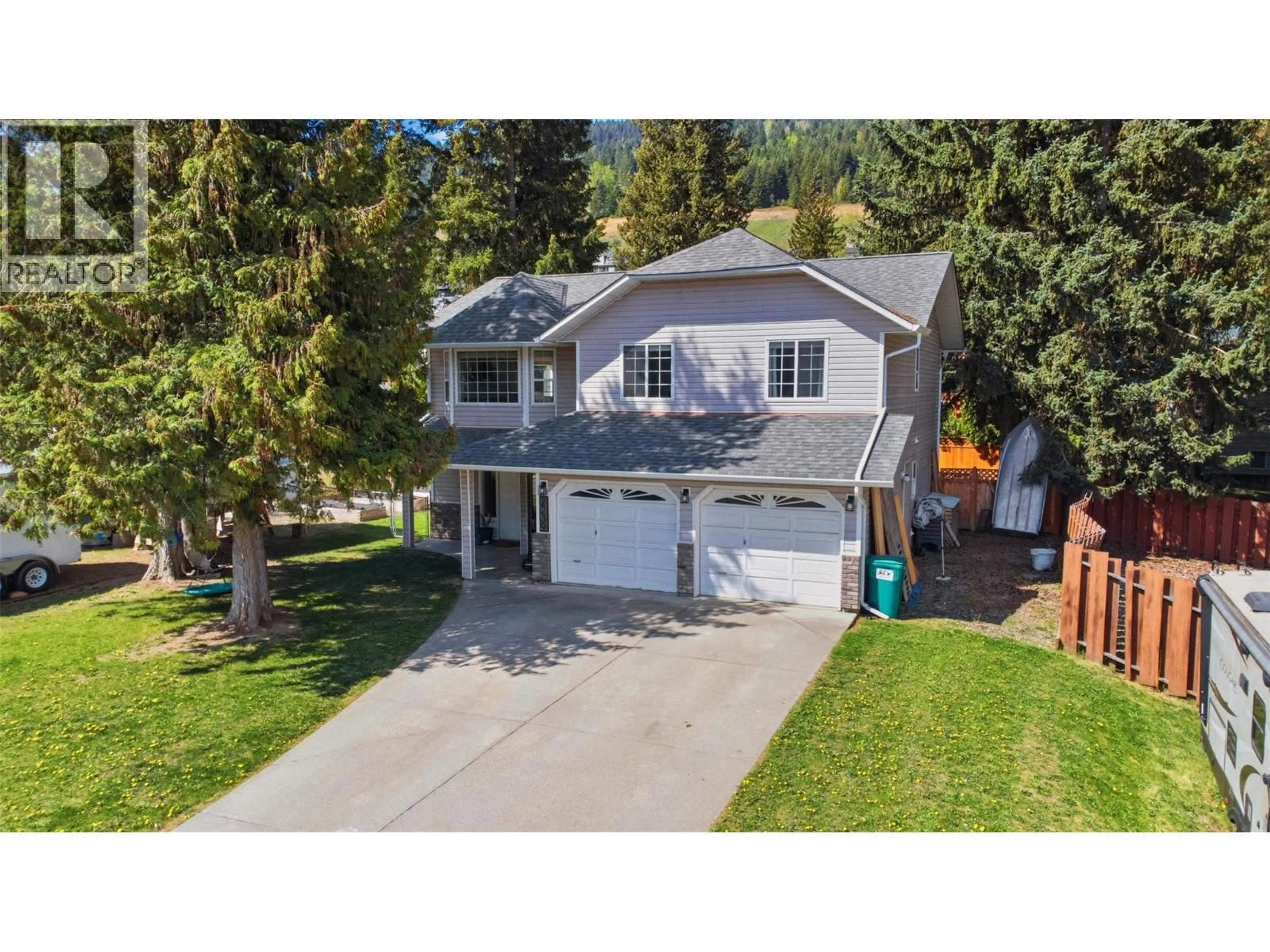 A pic from outside/outdoor area/front of a property/back of a property/a pic from drone, street for 2239 LINEA CRESCENT, Lumby British Columbia V0E2G0