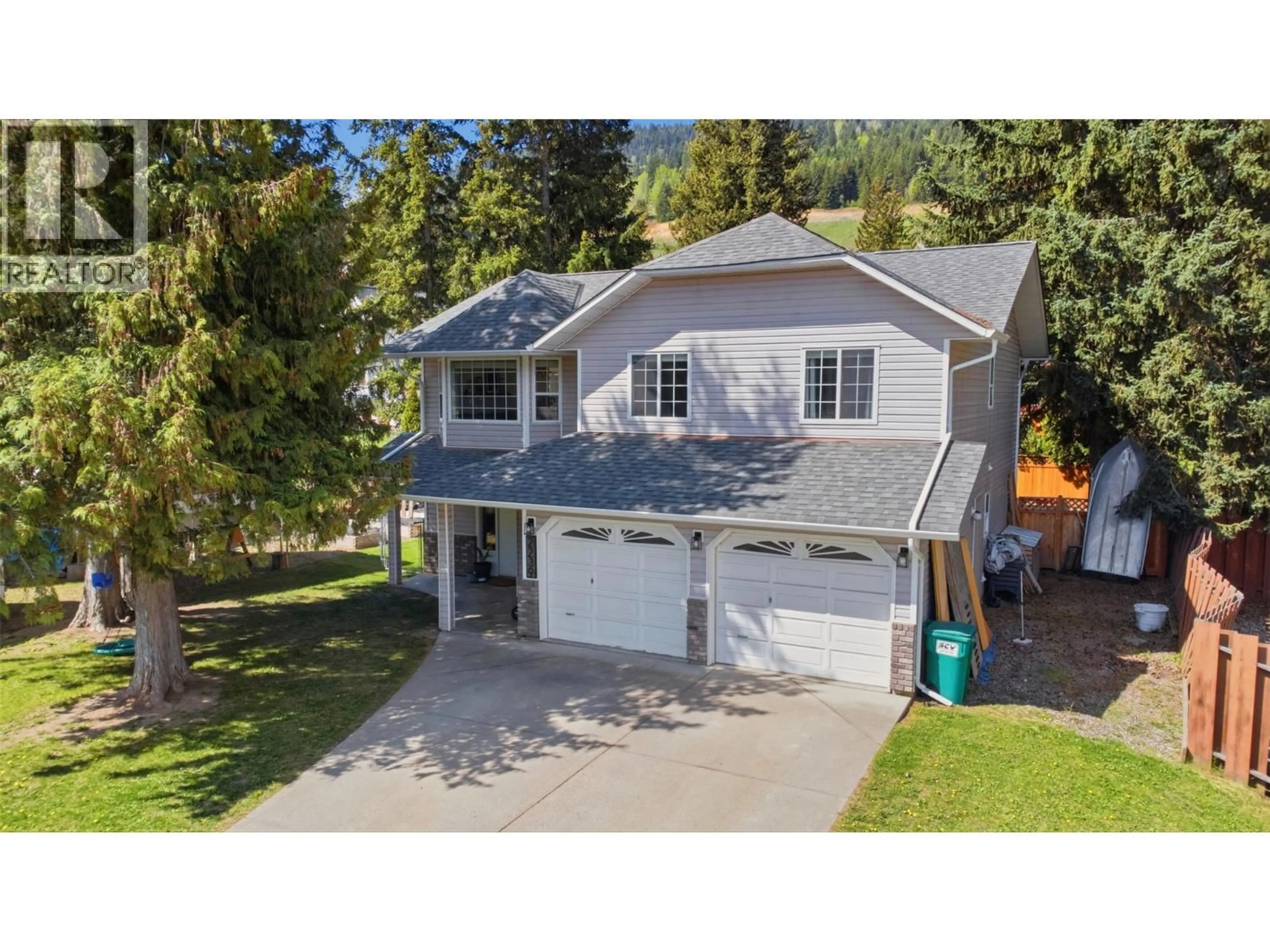 A pic from outside/outdoor area/front of a property/back of a property/a pic from drone, street for 2239 LINEA CRESCENT, Lumby British Columbia V0E2G0