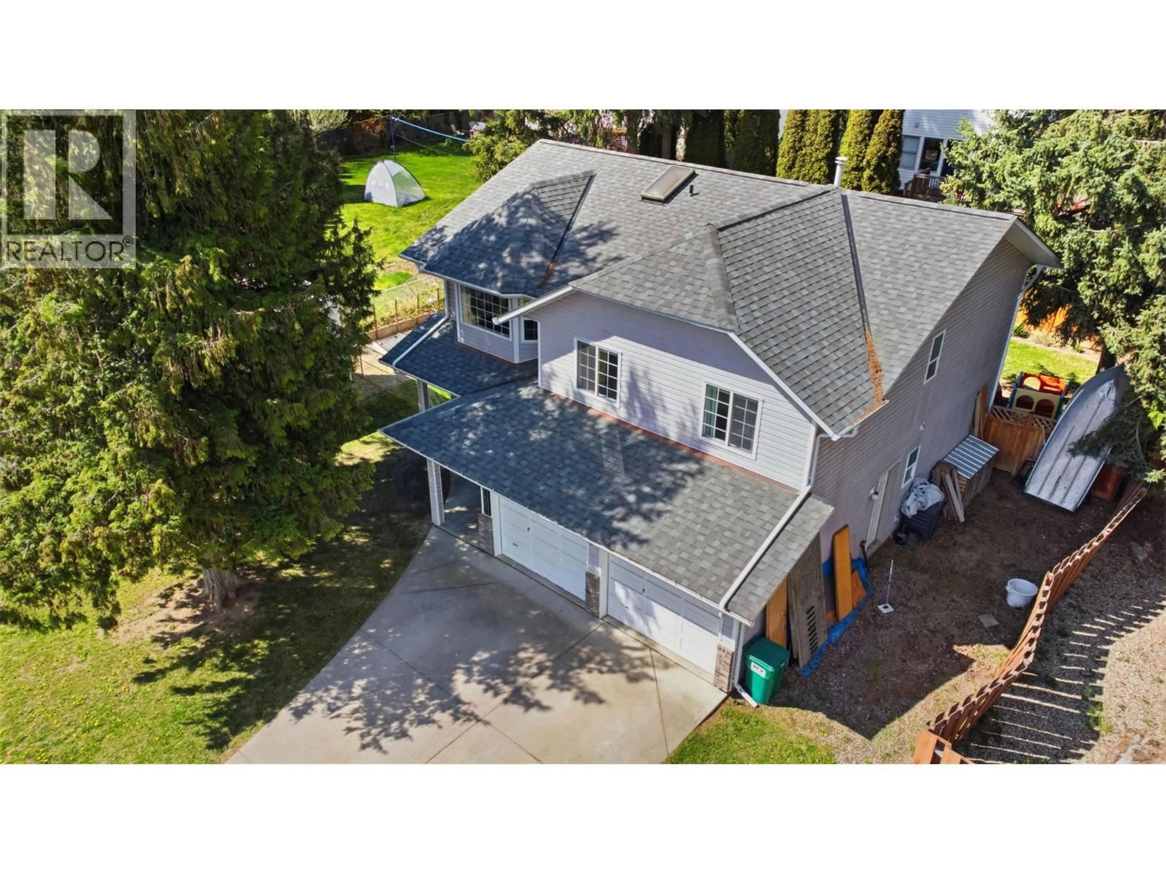 A pic from outside/outdoor area/front of a property/back of a property/a pic from drone, street for 2239 LINEA CRESCENT, Lumby British Columbia V0E2G0