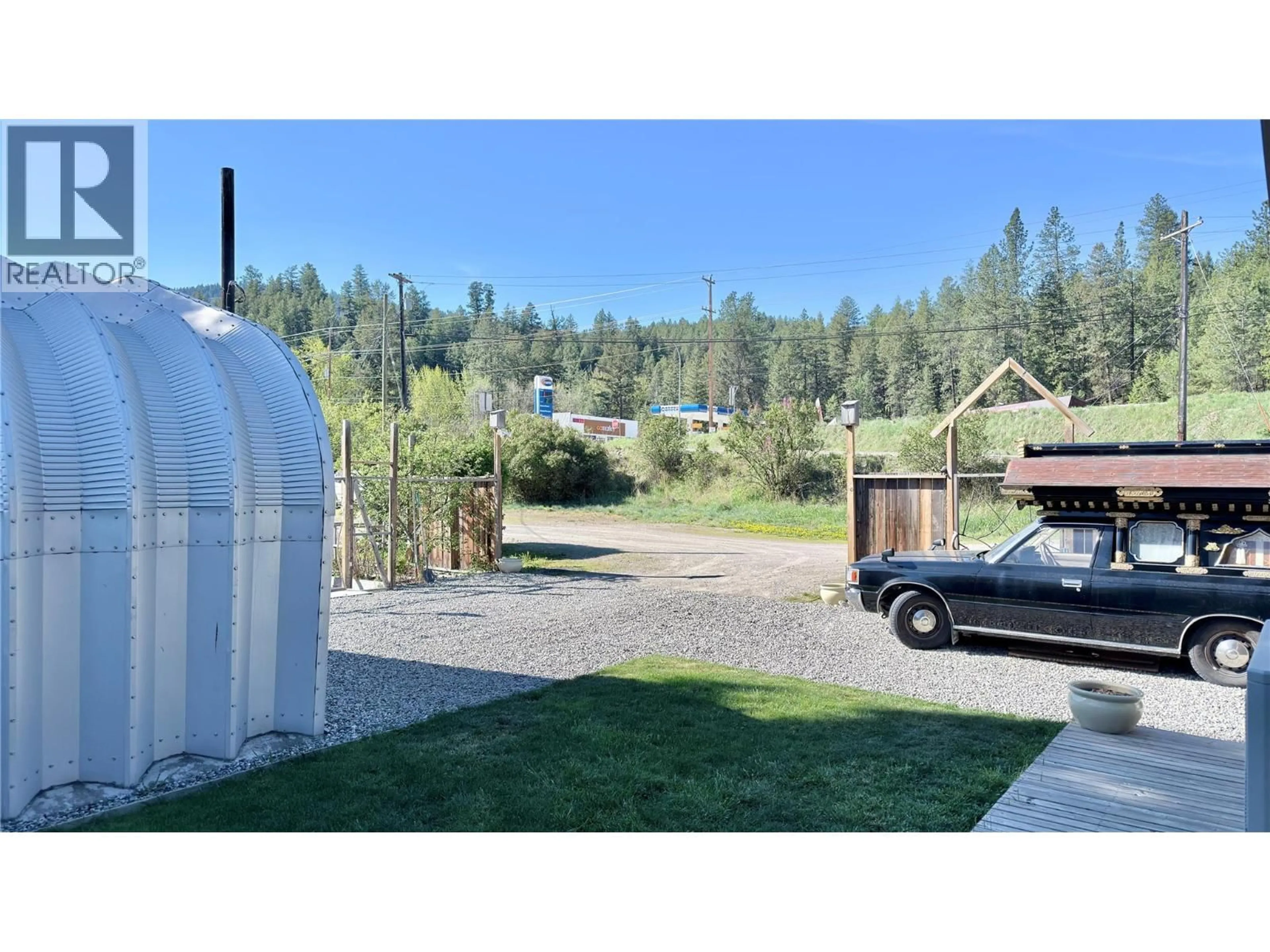 A pic from outside/outdoor area/front of a property/back of a property/a pic from drone, unknown for 1606 33 HIGHWAY, Rock Creek British Columbia V0H1Y0