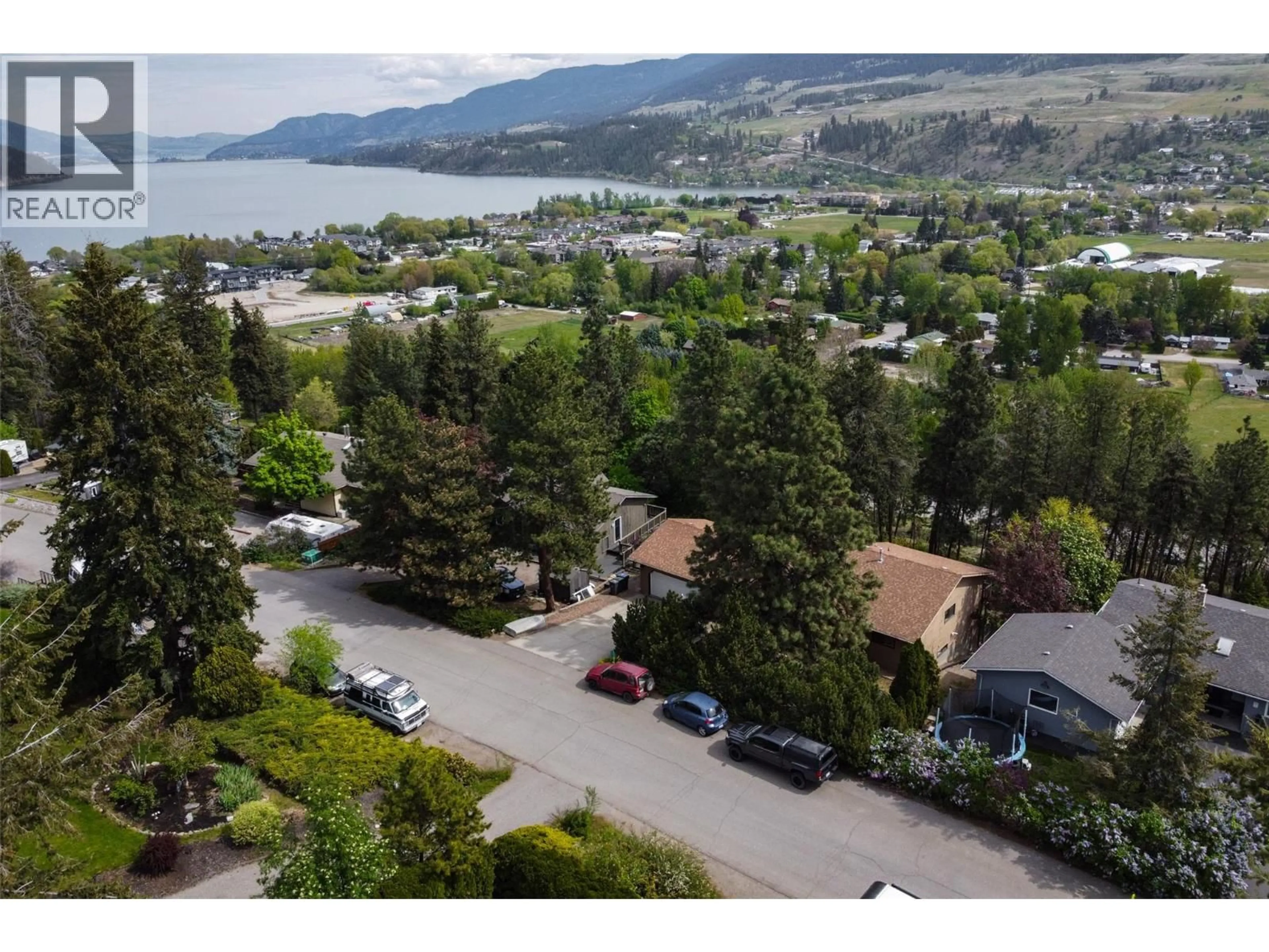 A pic from outside/outdoor area/front of a property/back of a property/a pic from drone, water/lake/river/ocean view for 11075 EVA ROAD, Lake Country British Columbia V4V1H4