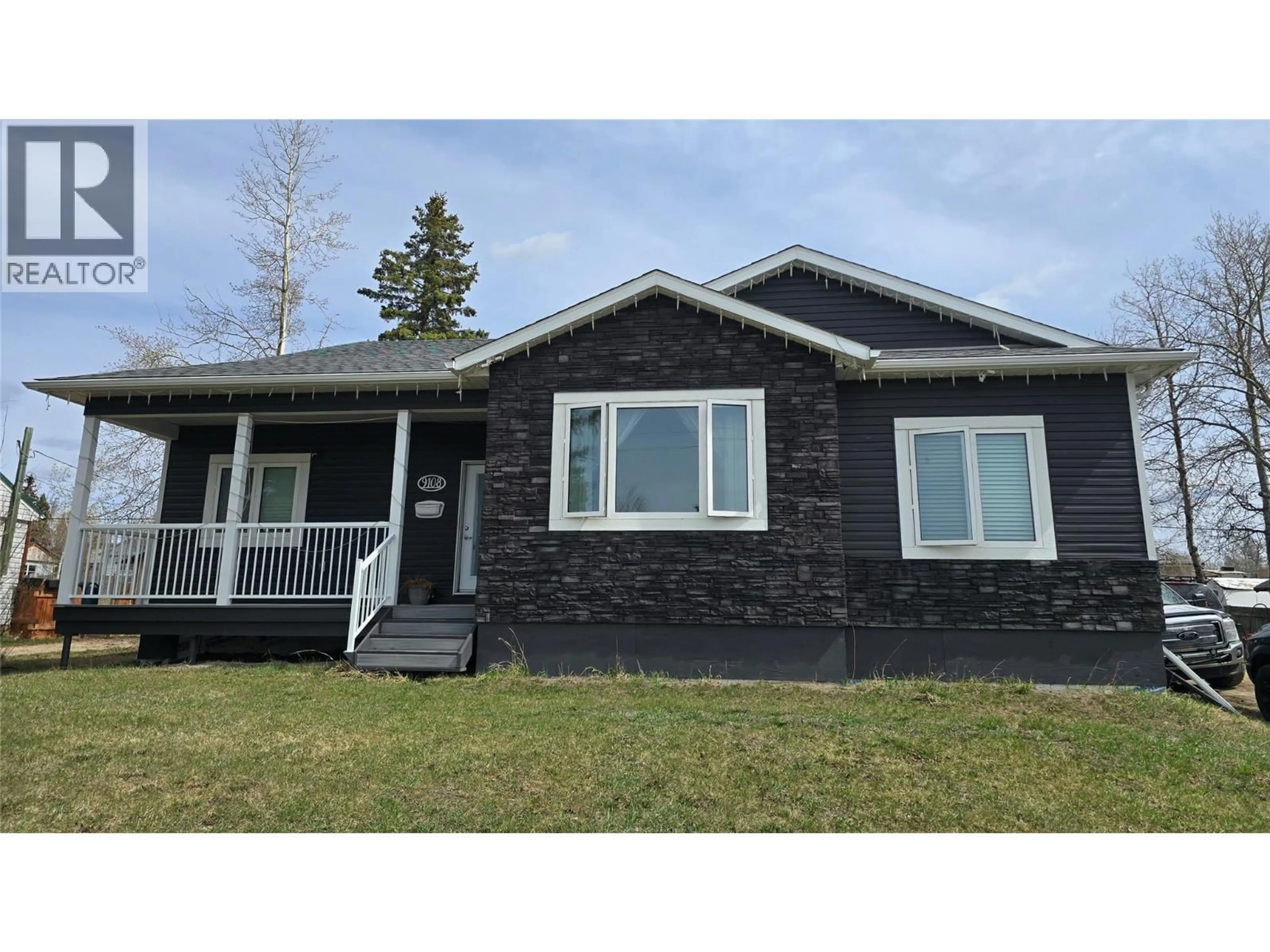 Home with vinyl exterior material, street for 9108 8 STREET, Dawson Creek British Columbia V1G3N4