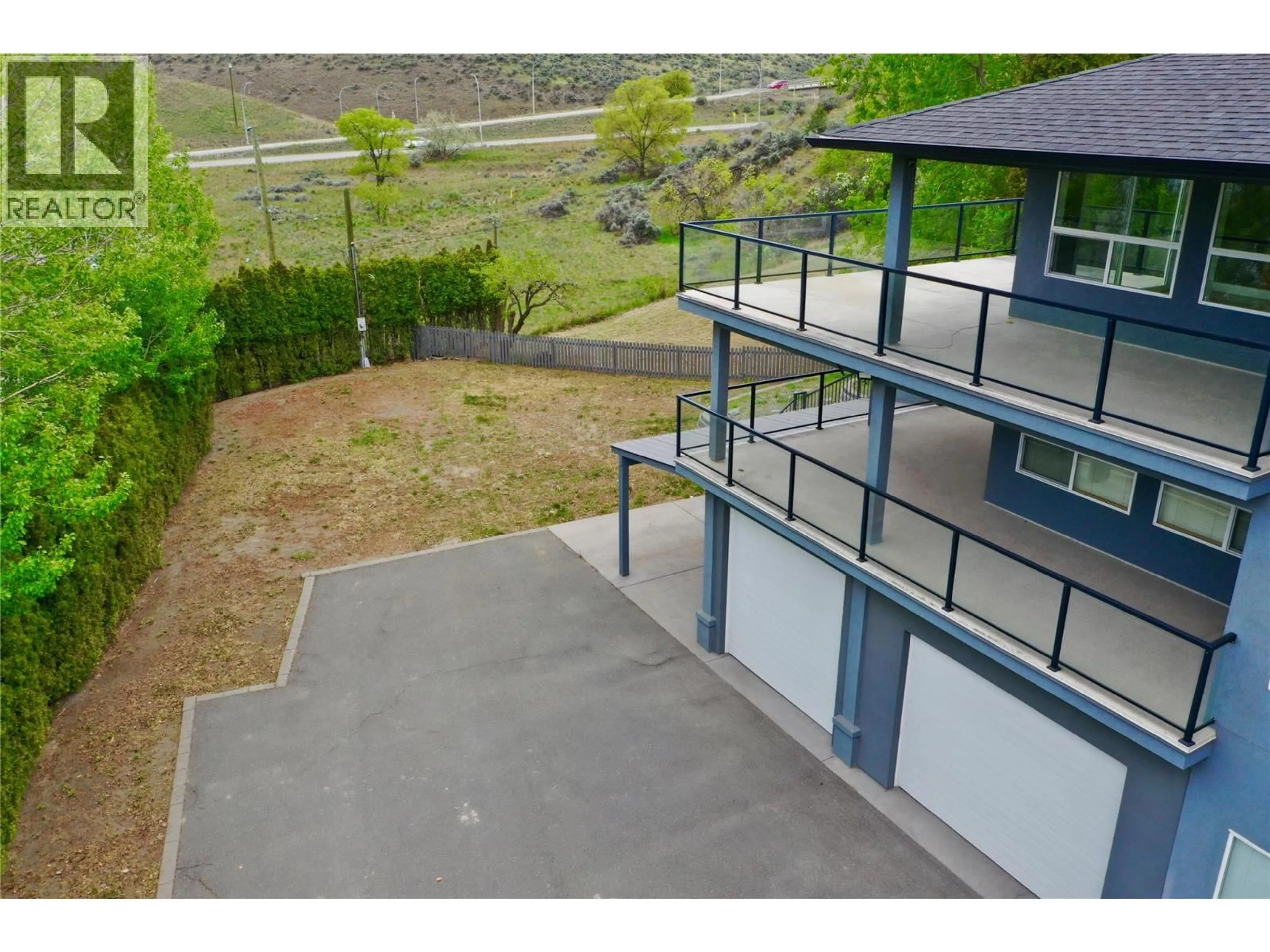 A pic from outside/outdoor area/front of a property/back of a property/a pic from drone, mountain view for 1491 PINE CRESCENT, Kamloops British Columbia V2C2Z4