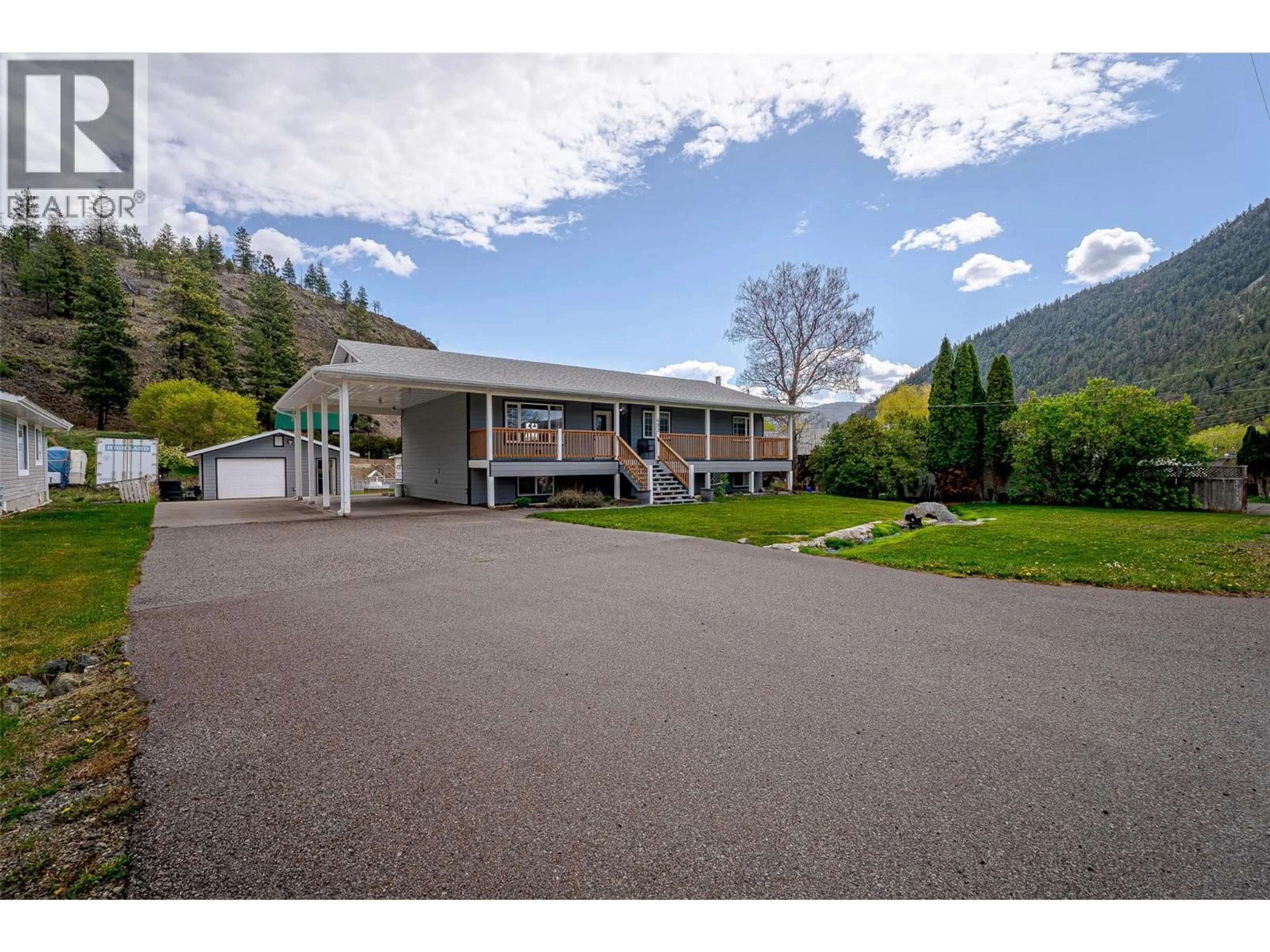 A pic from outside/outdoor area/front of a property/back of a property/a pic from drone, mountain view for 493 MARSHALL ROAD, Merritt British Columbia V1K1N5