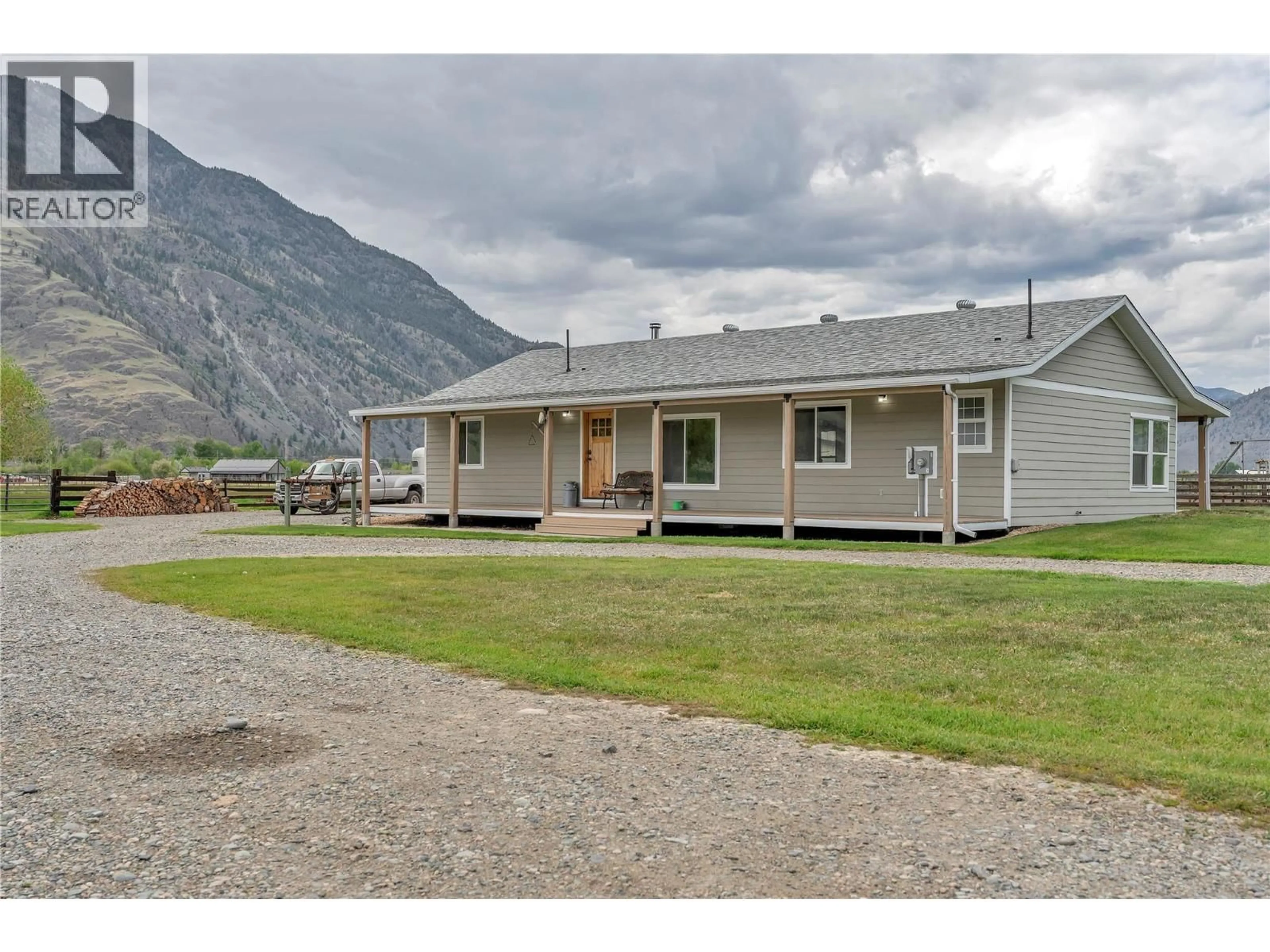 A pic from outside/outdoor area/front of a property/back of a property/a pic from drone, mountain view for 1911 STEWART ROAD, Cawston British Columbia V0X1C1