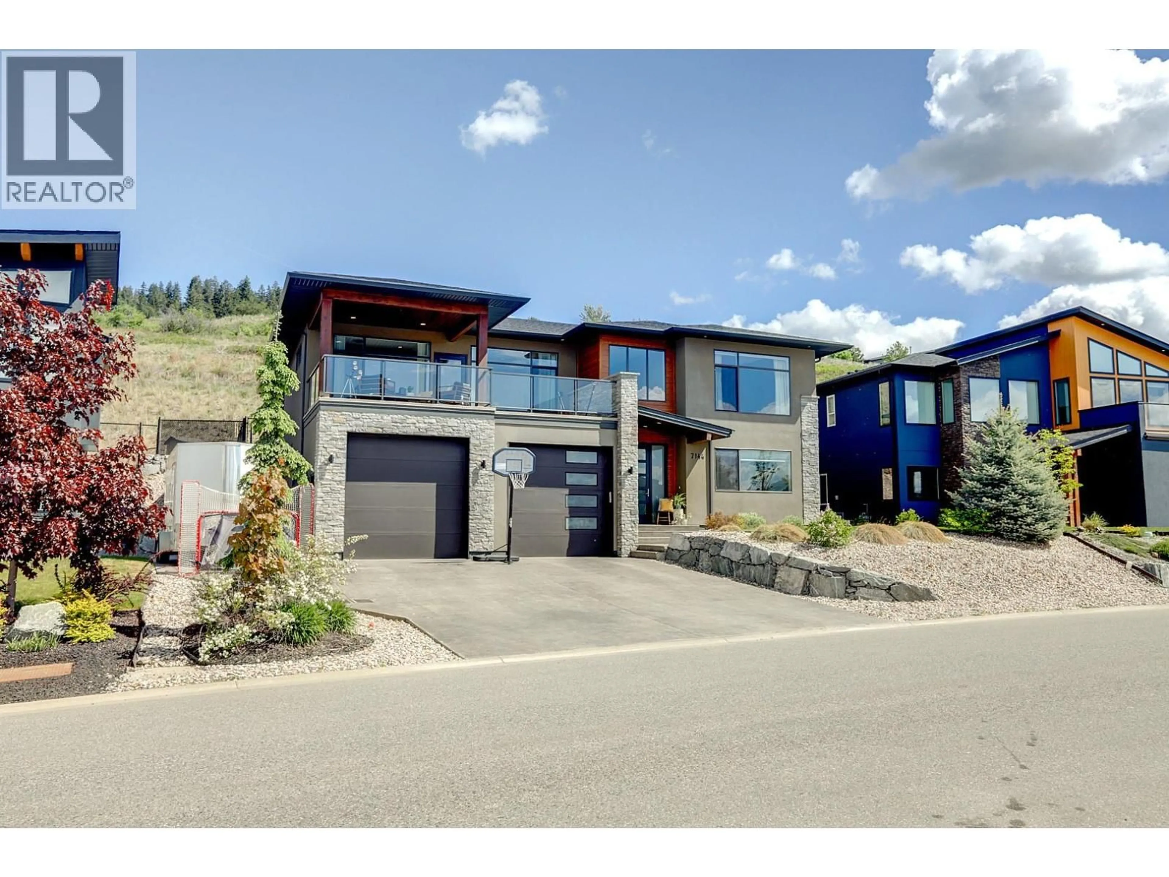 Home with brick exterior material, street for 7144 APEX DRIVE, Vernon British Columbia V1B4E4