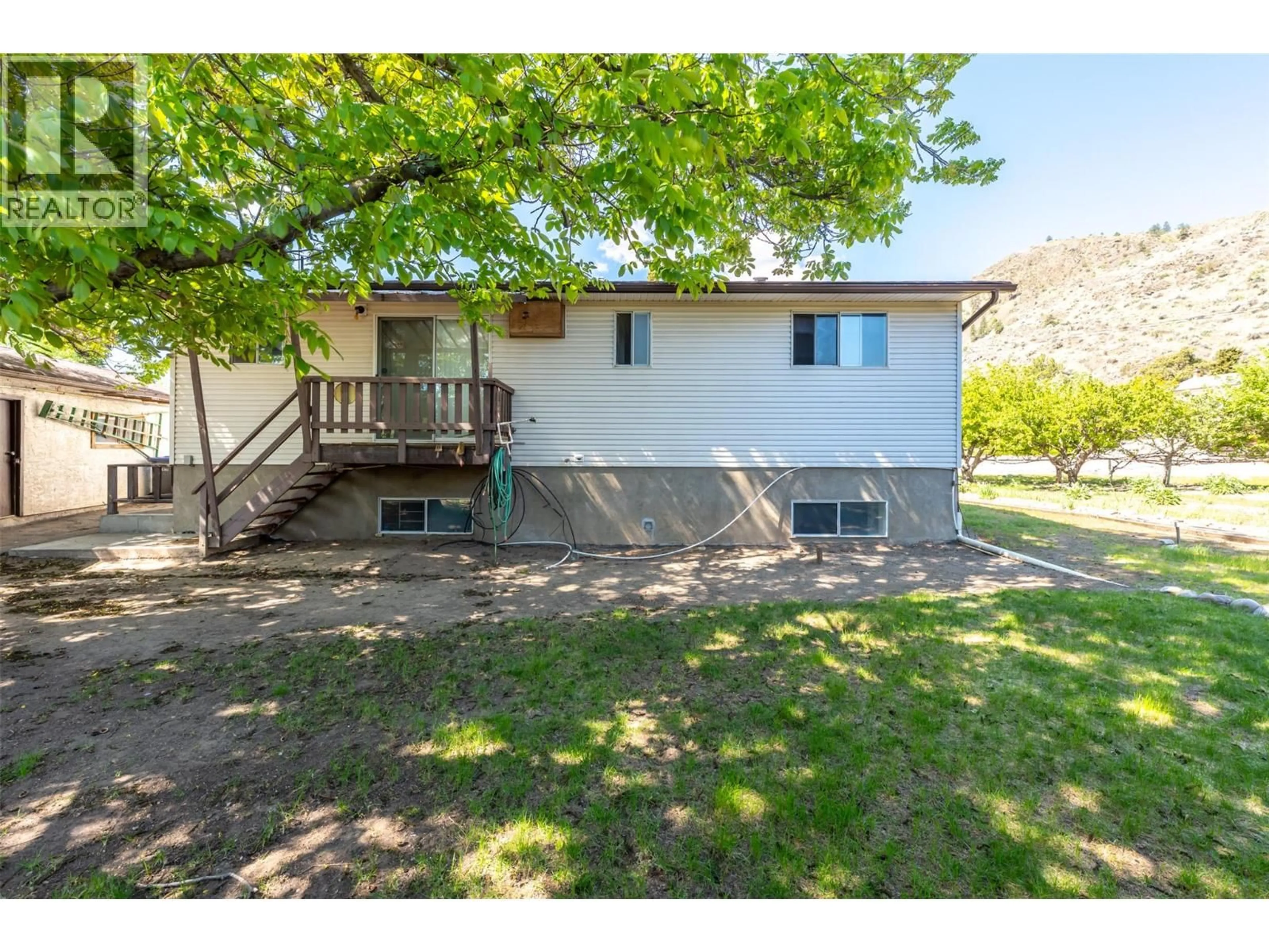 A pic from outside/outdoor area/front of a property/back of a property/a pic from drone, street for 1083 MORNINGSTAR ROAD, Oliver British Columbia V0H1T6