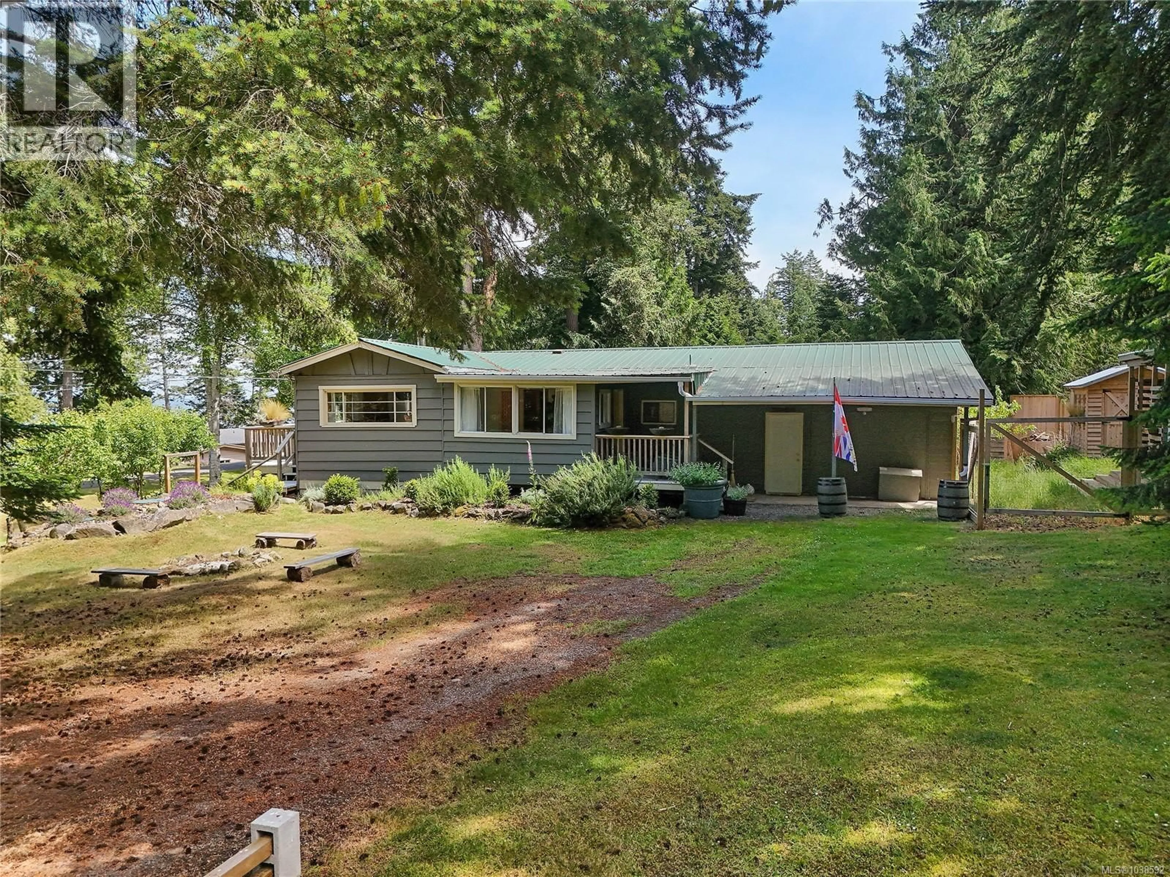 A pic from outside/outdoor area/front of a property/back of a property/a pic from drone, water/lake/river/ocean view for 222 SKANA GATE ROAD, Mayne Island British Columbia V0N2J1