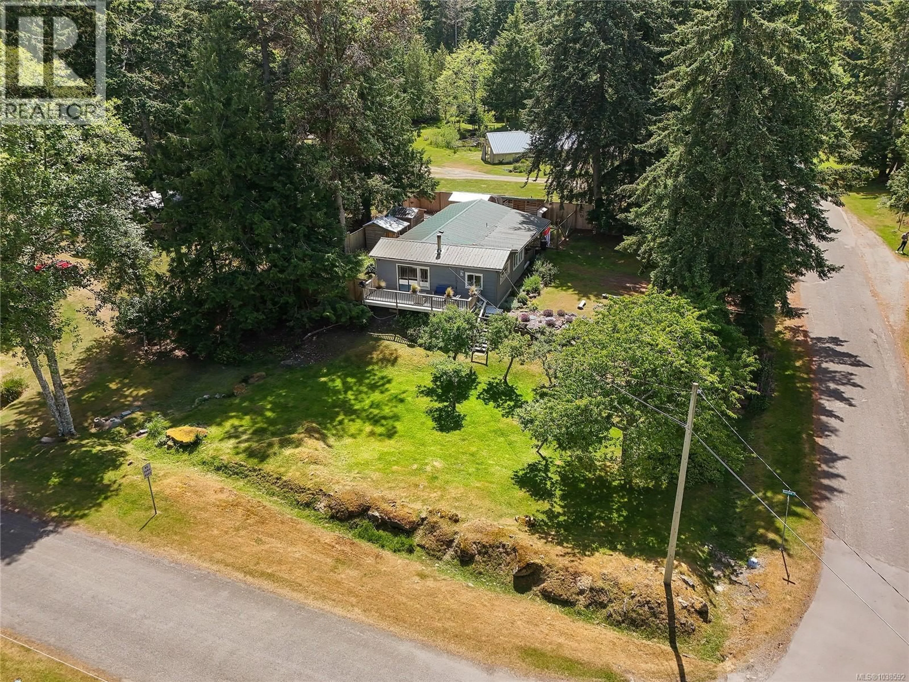 A pic from outside/outdoor area/front of a property/back of a property/a pic from drone, unknown for 222 SKANA GATE ROAD, Mayne Island British Columbia V0N2J1