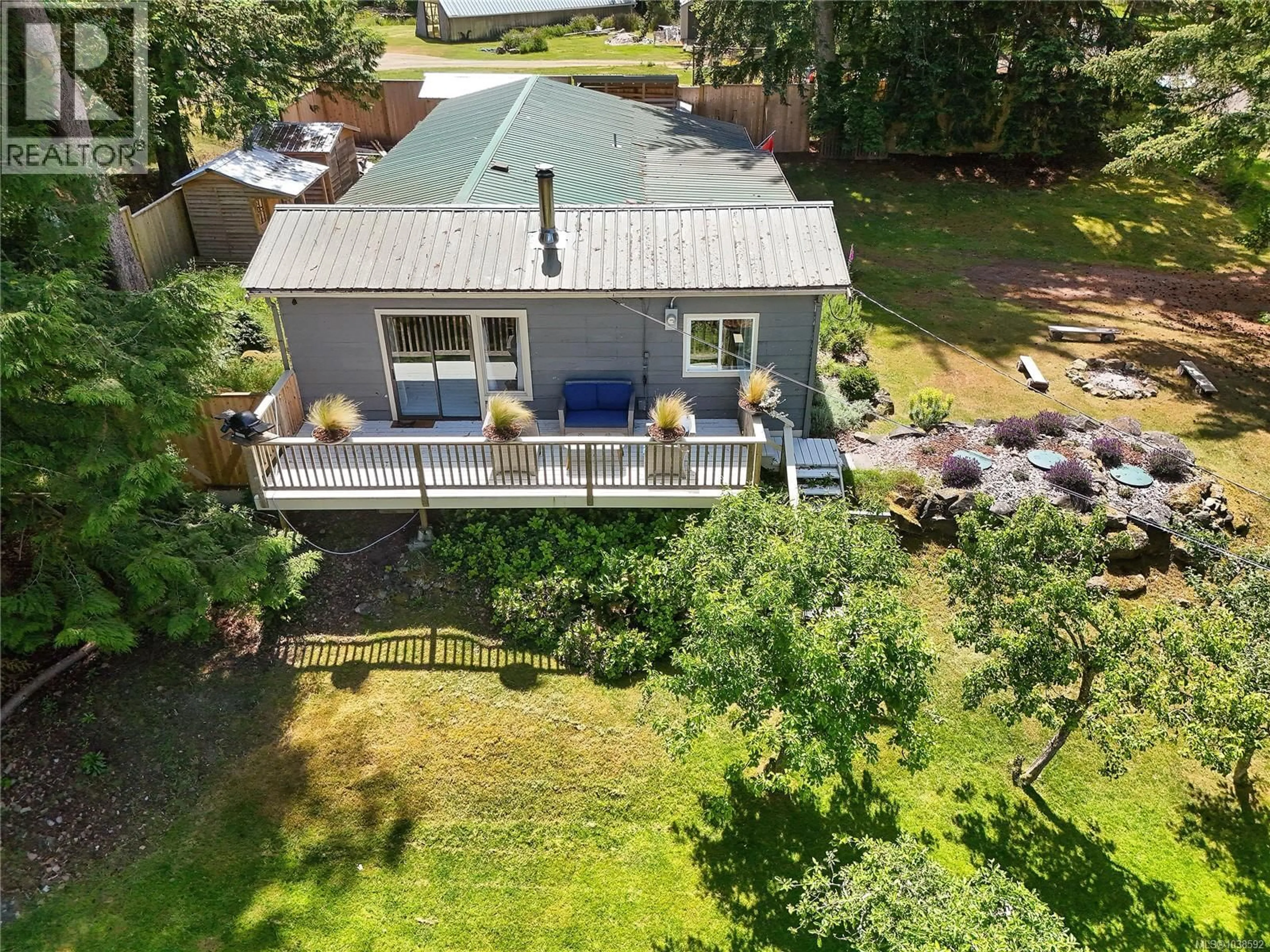 A pic from outside/outdoor area/front of a property/back of a property/a pic from drone, water/lake/river/ocean view for 222 SKANA GATE ROAD, Mayne Island British Columbia V0N2J1