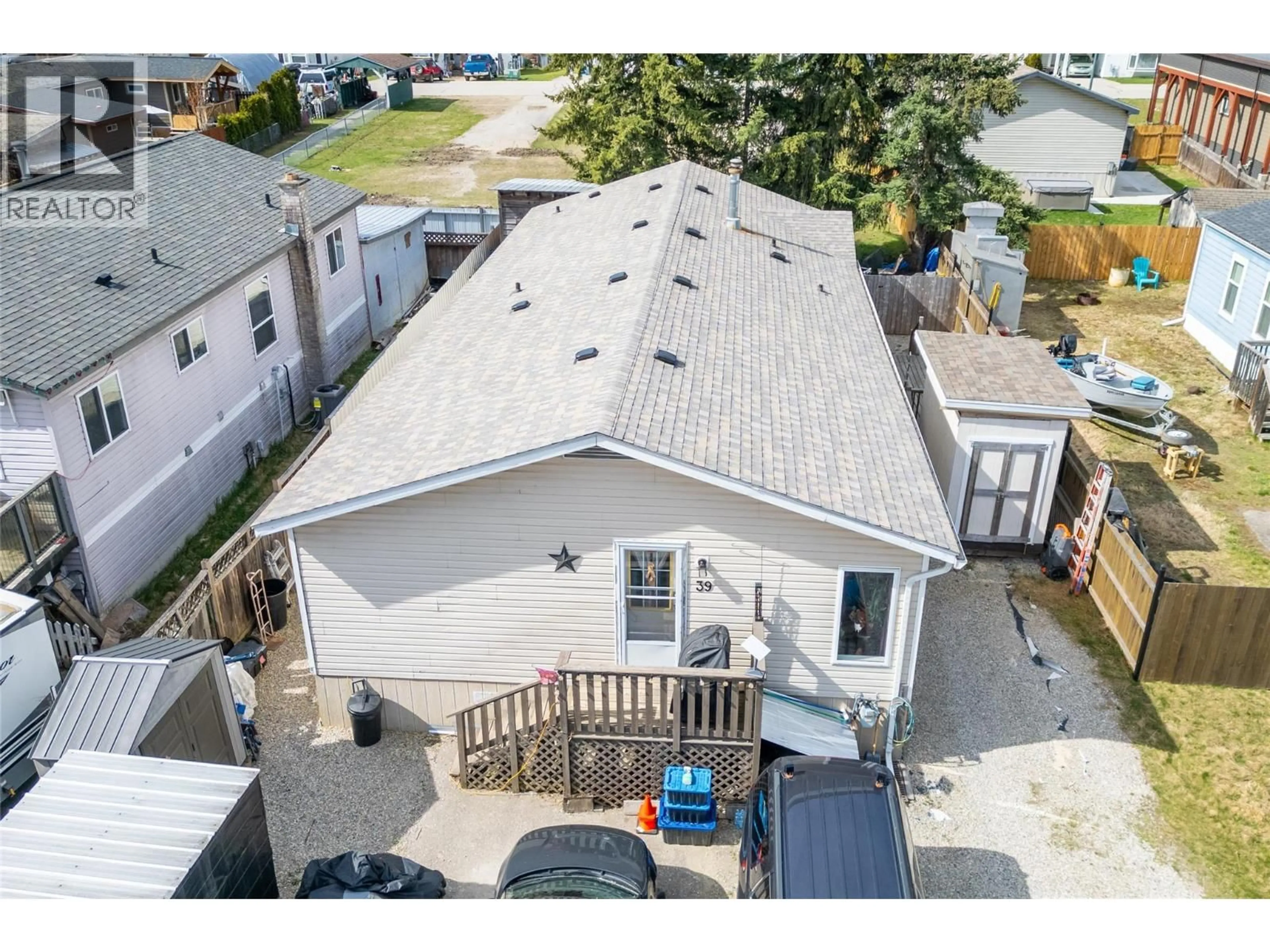 A pic from outside/outdoor area/front of a property/back of a property/a pic from drone, street for 39 JOHNSON WAY, Revelstoke British Columbia V0E2S0