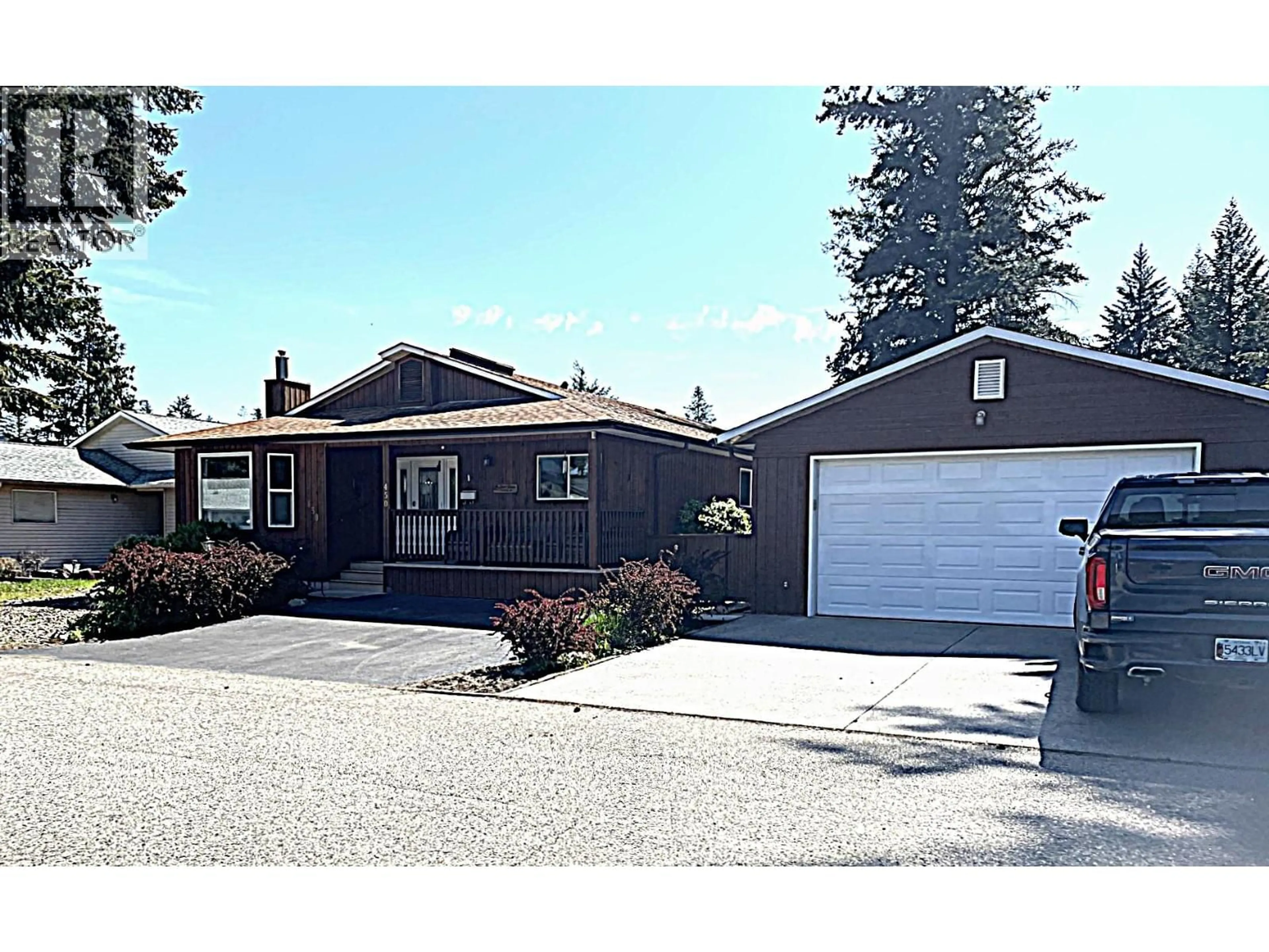 Home with vinyl exterior material, street for 450 IBIS AVENUE, Vernon British Columbia V1H2A1