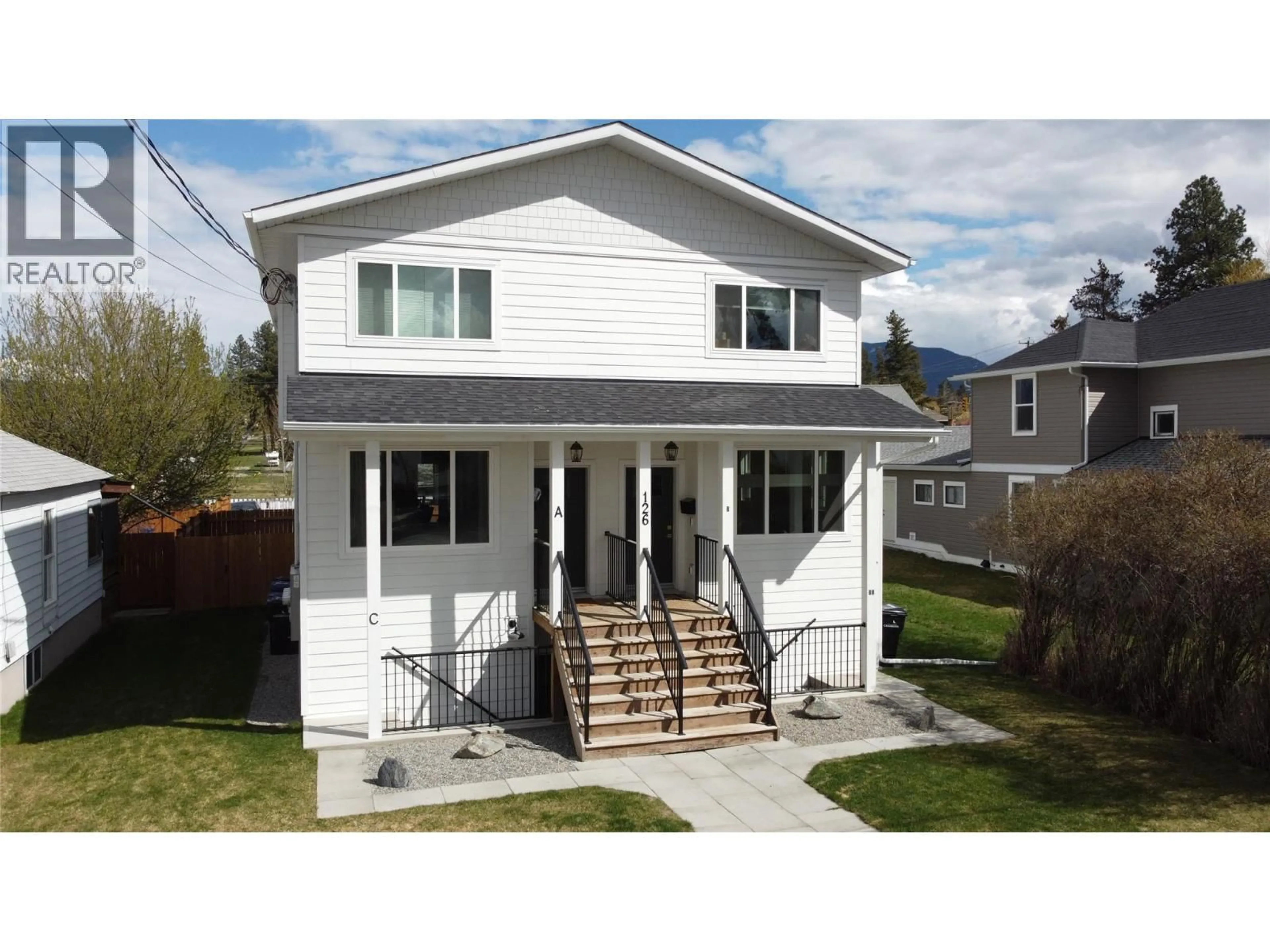 Home with vinyl exterior material, street for A & C - 126 13TH AVENUE SOUTH, Cranbrook British Columbia V1C2V5