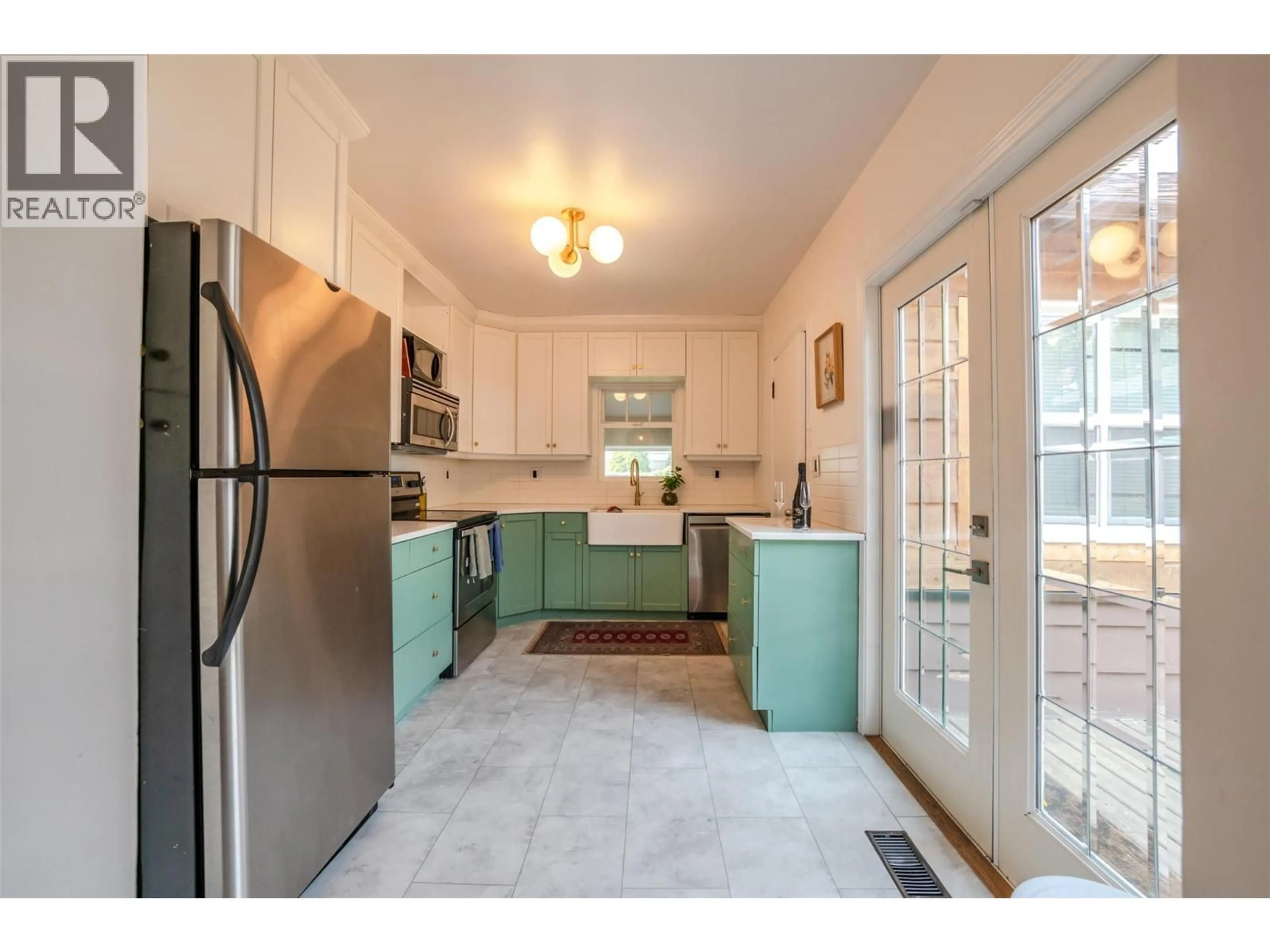 Open concept kitchen, ceramic/tile floor for 1045 MANITOBA STREET, Penticton British Columbia V2A4Z8