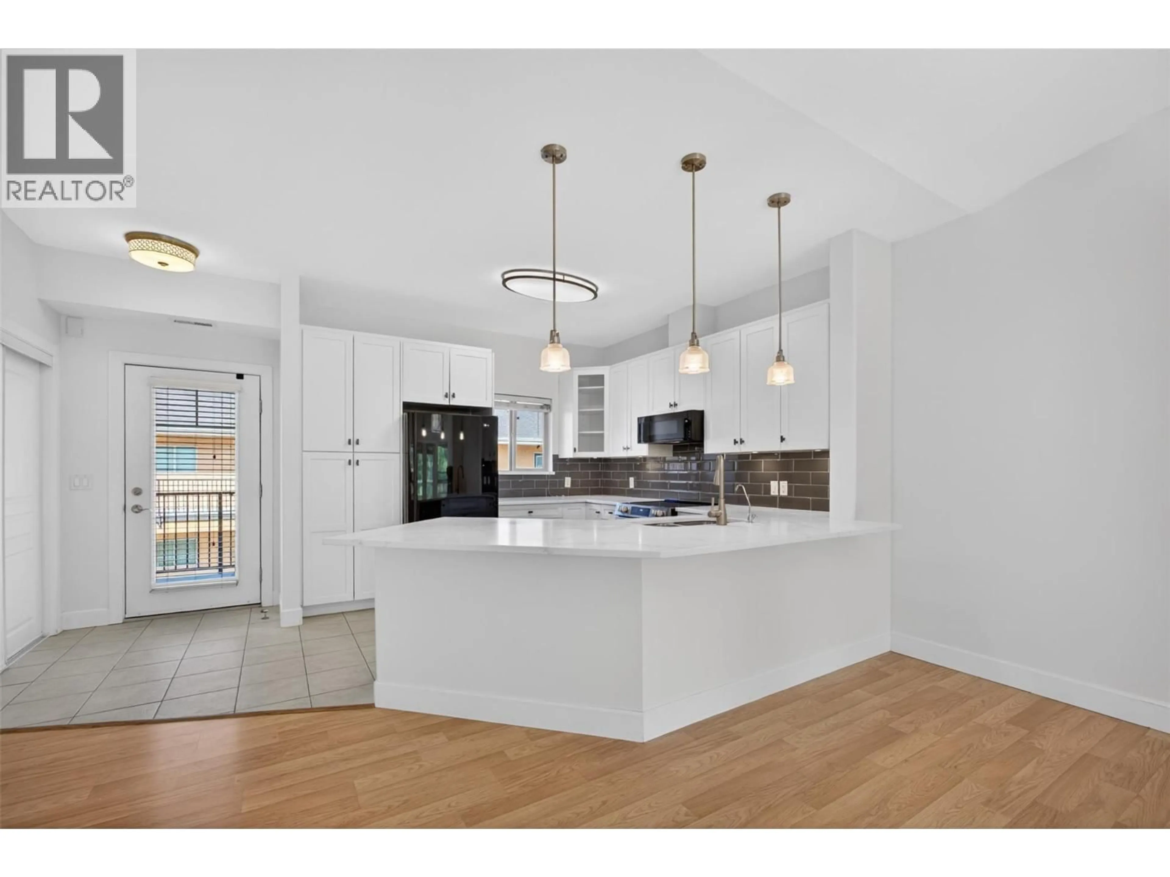 Open concept kitchen, unknown for 331 - 3996 BEACH AVENUE, Peachland British Columbia V0H1X5
