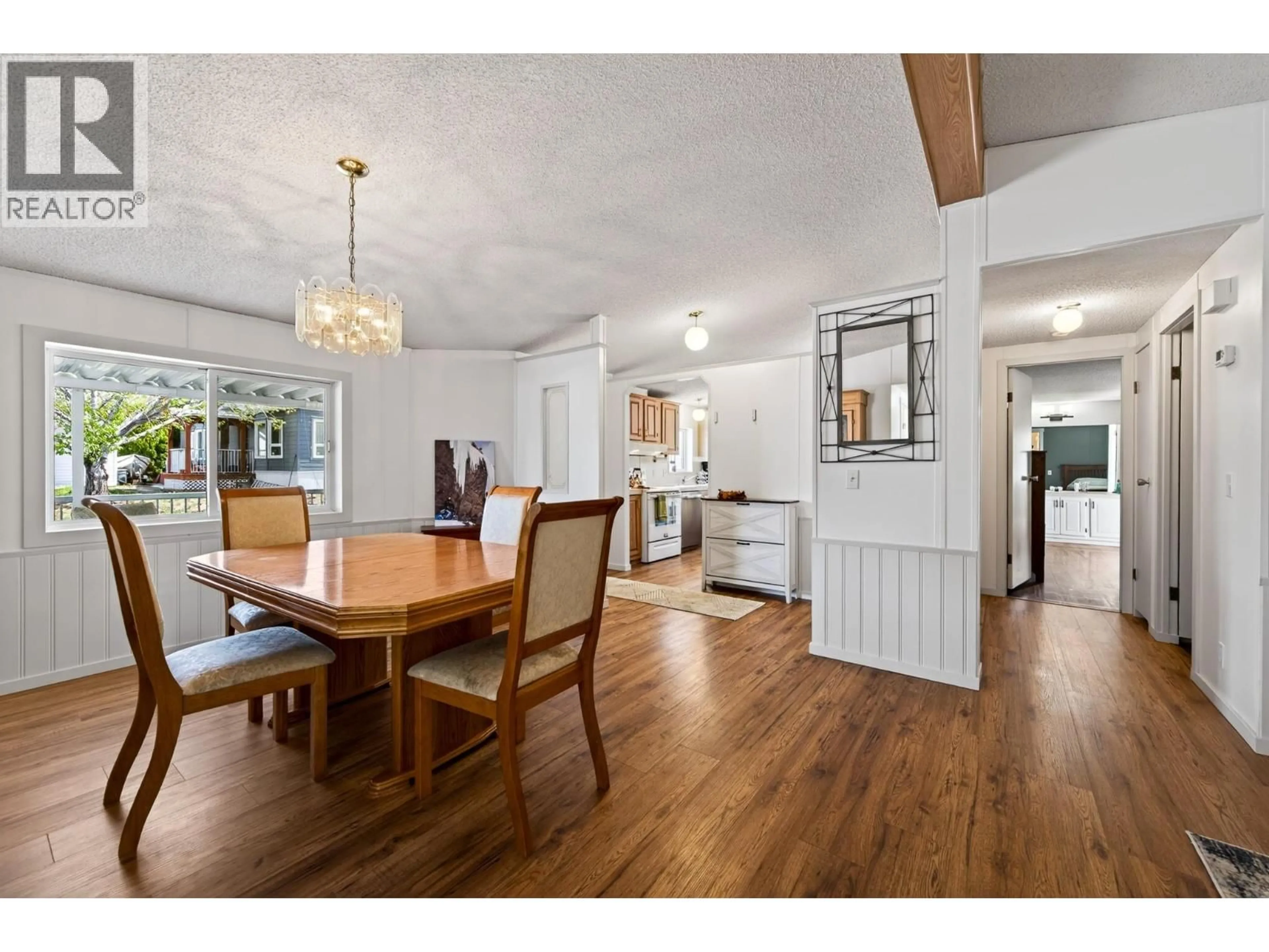 Dining room, wood/laminate floor for 7070 WATSON DRIVE EAST, Kamloops British Columbia V0K2J0