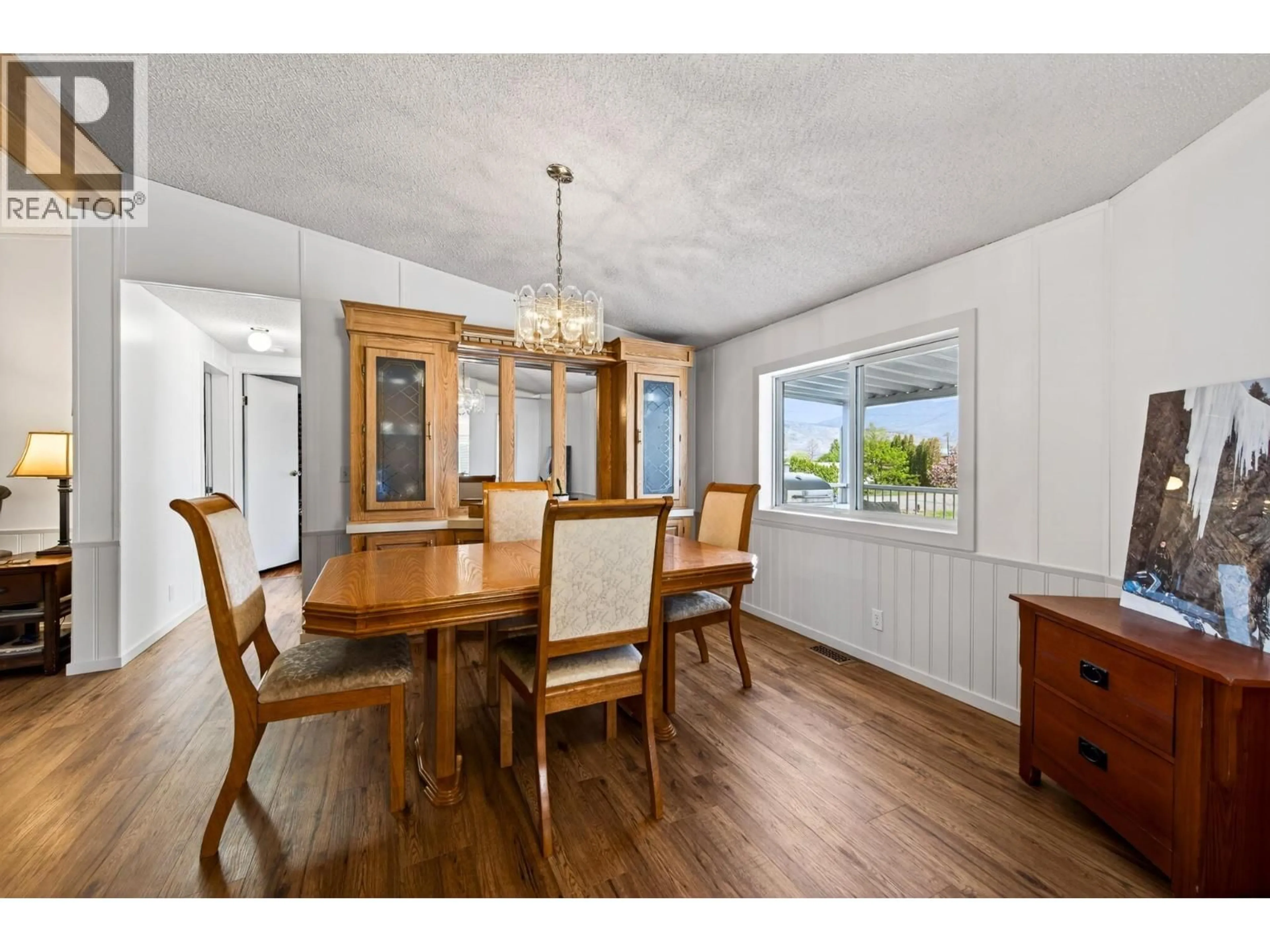 Dining room, wood/laminate floor for 7070 WATSON DRIVE EAST, Kamloops British Columbia V0K2J0