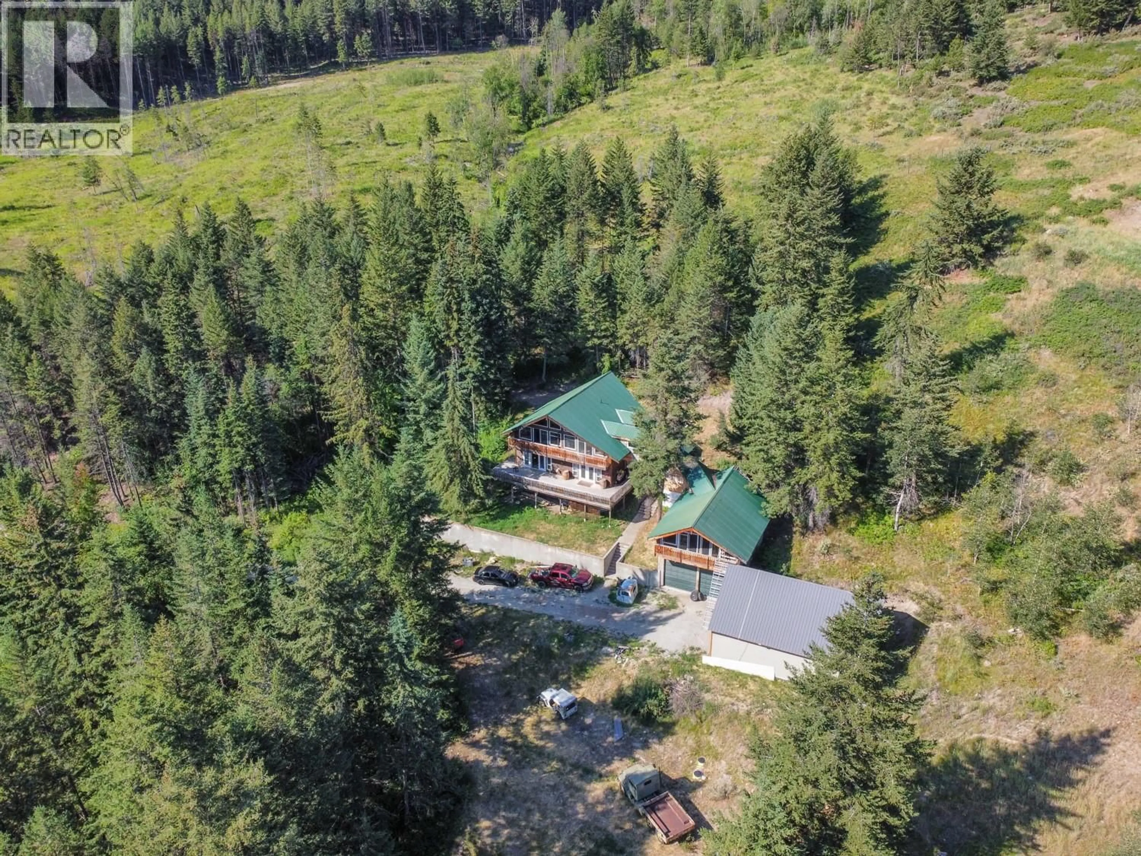 A pic from outside/outdoor area/front of a property/back of a property/a pic from drone, forest/trees view for 842 GRAND ORO ROAD, Kaleden British Columbia V0H1K0